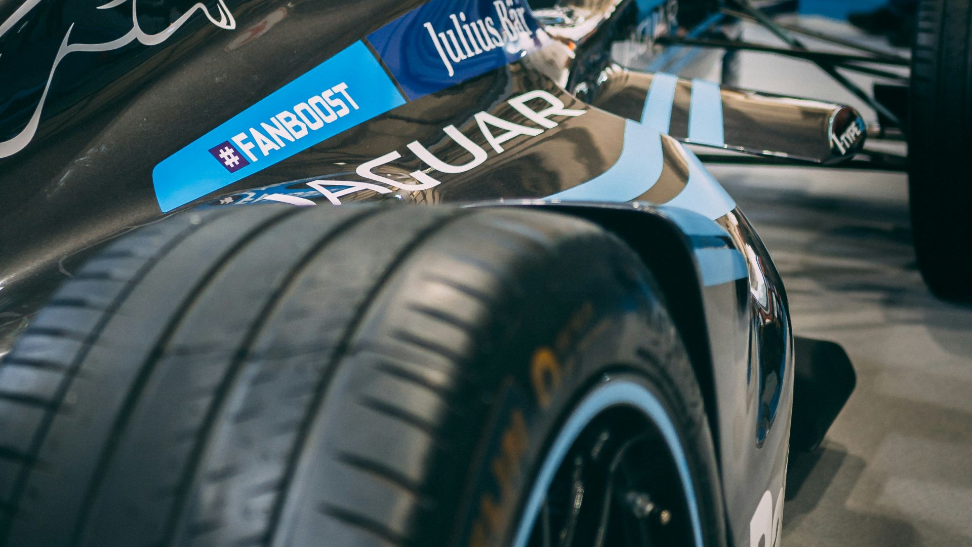 selective focus photography of parked racecar