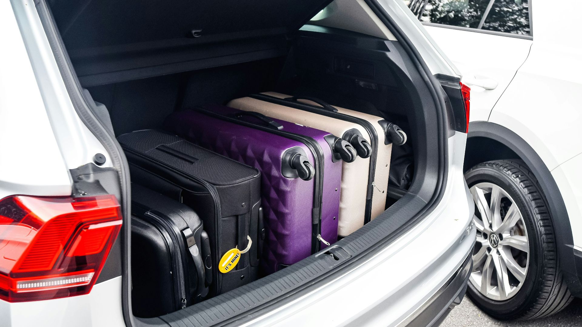a car with a suitcase in the trunk