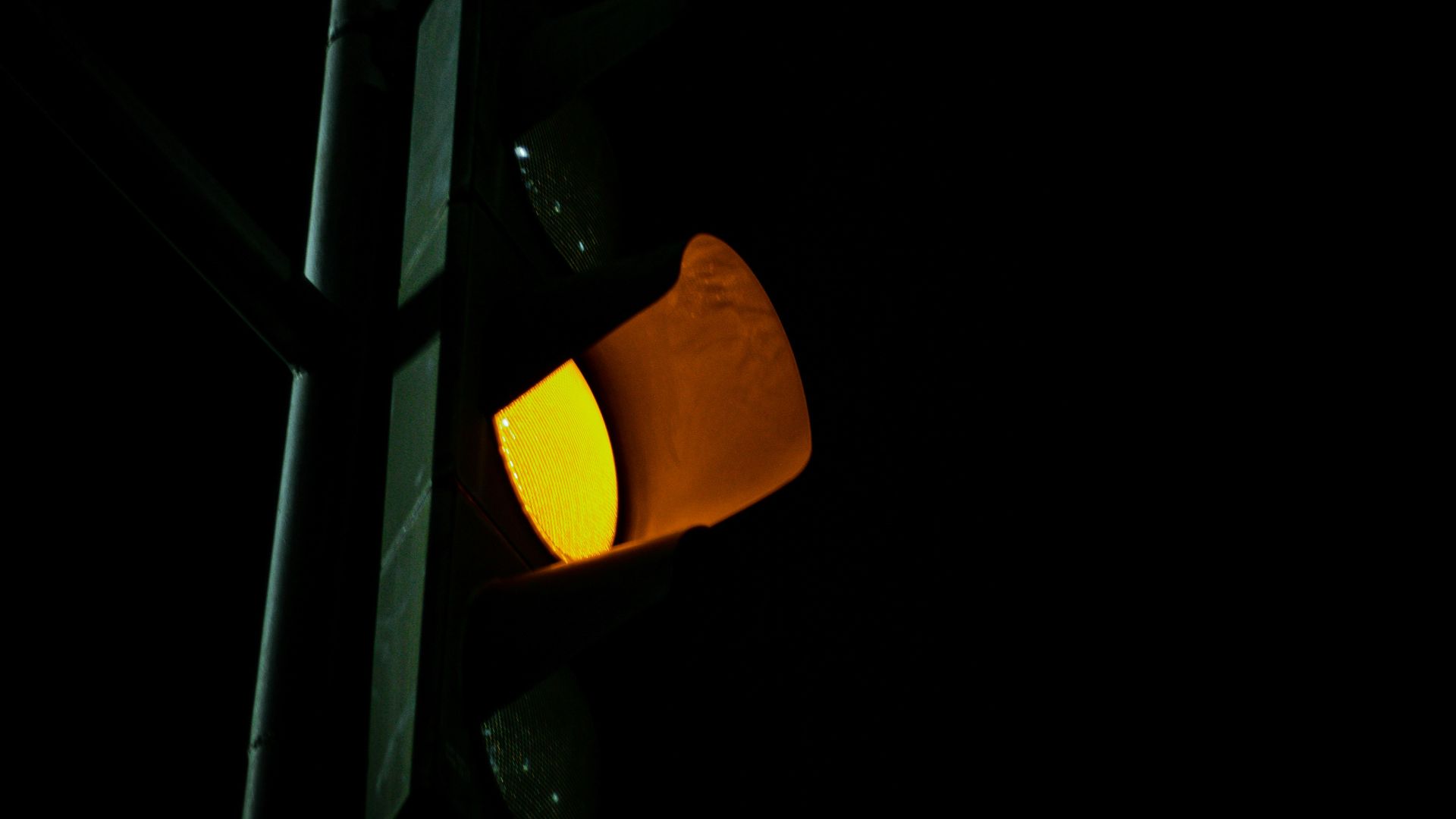 a traffic light that is on a pole