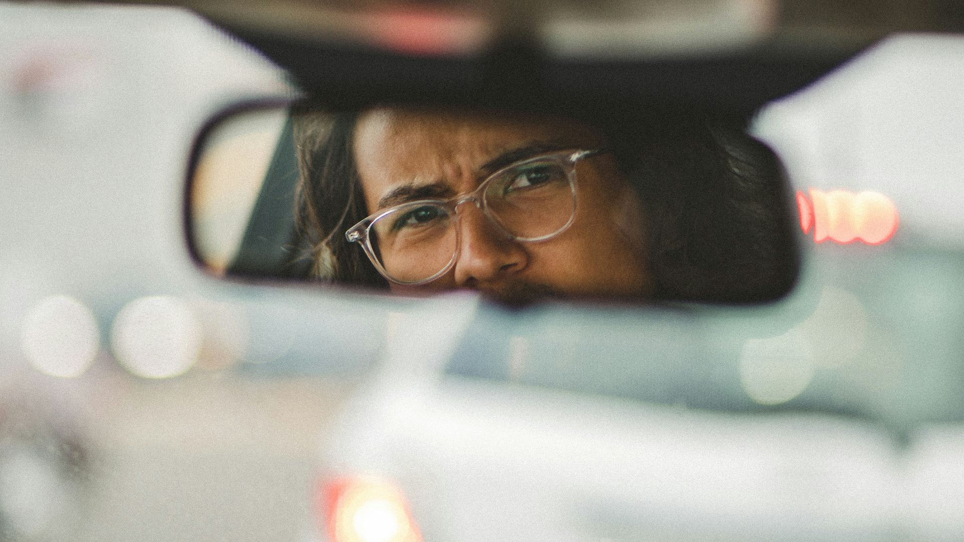 man in black framed eyeglasses