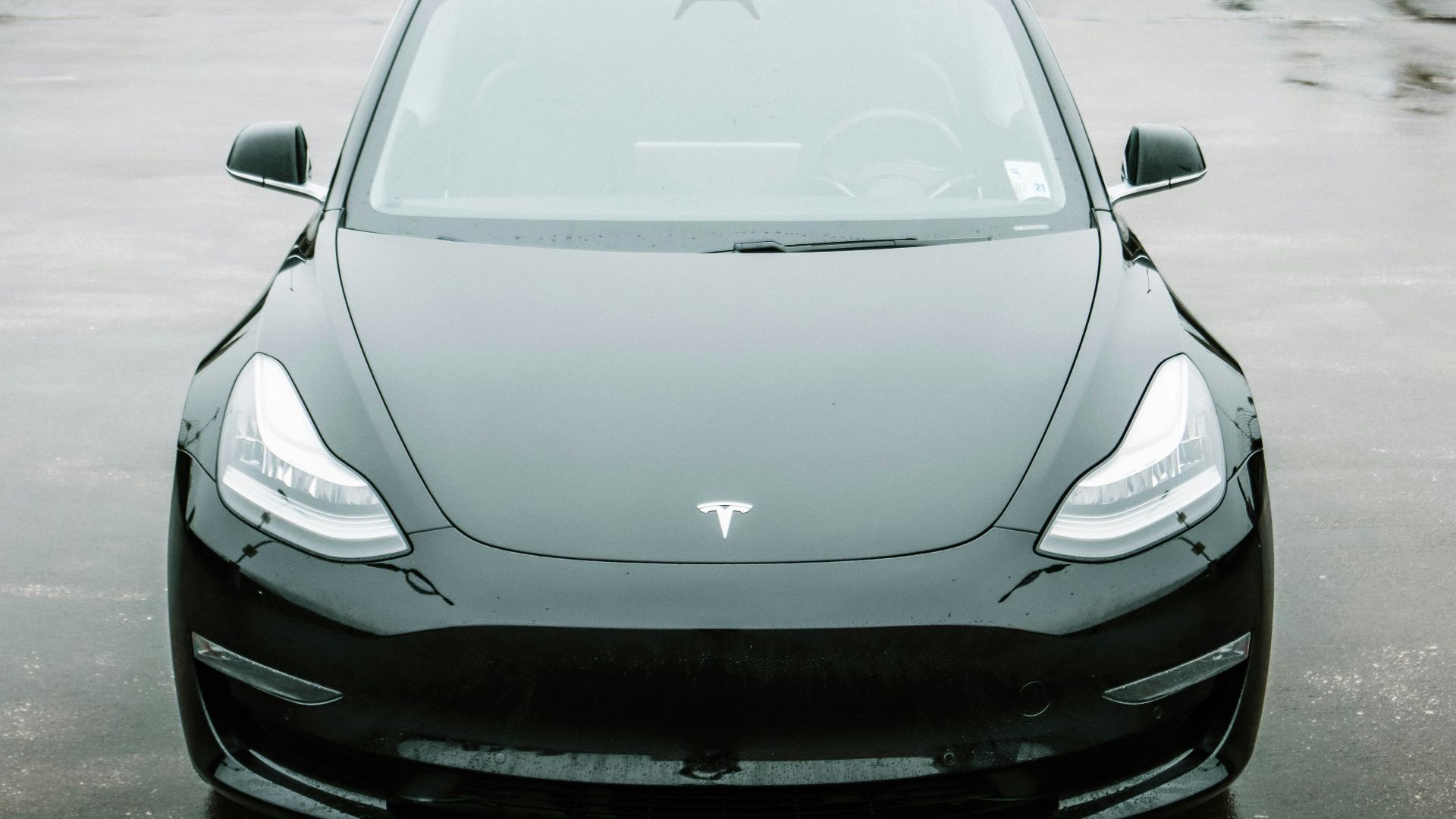 silver porsche 911 parked on parking lot during daytime