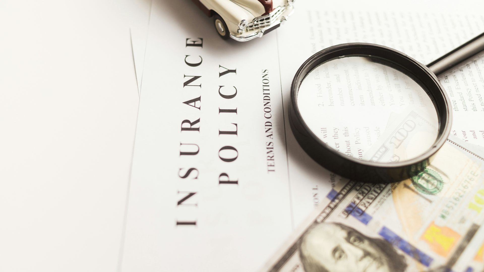 a magnifying glass sitting on top of a piece of paper