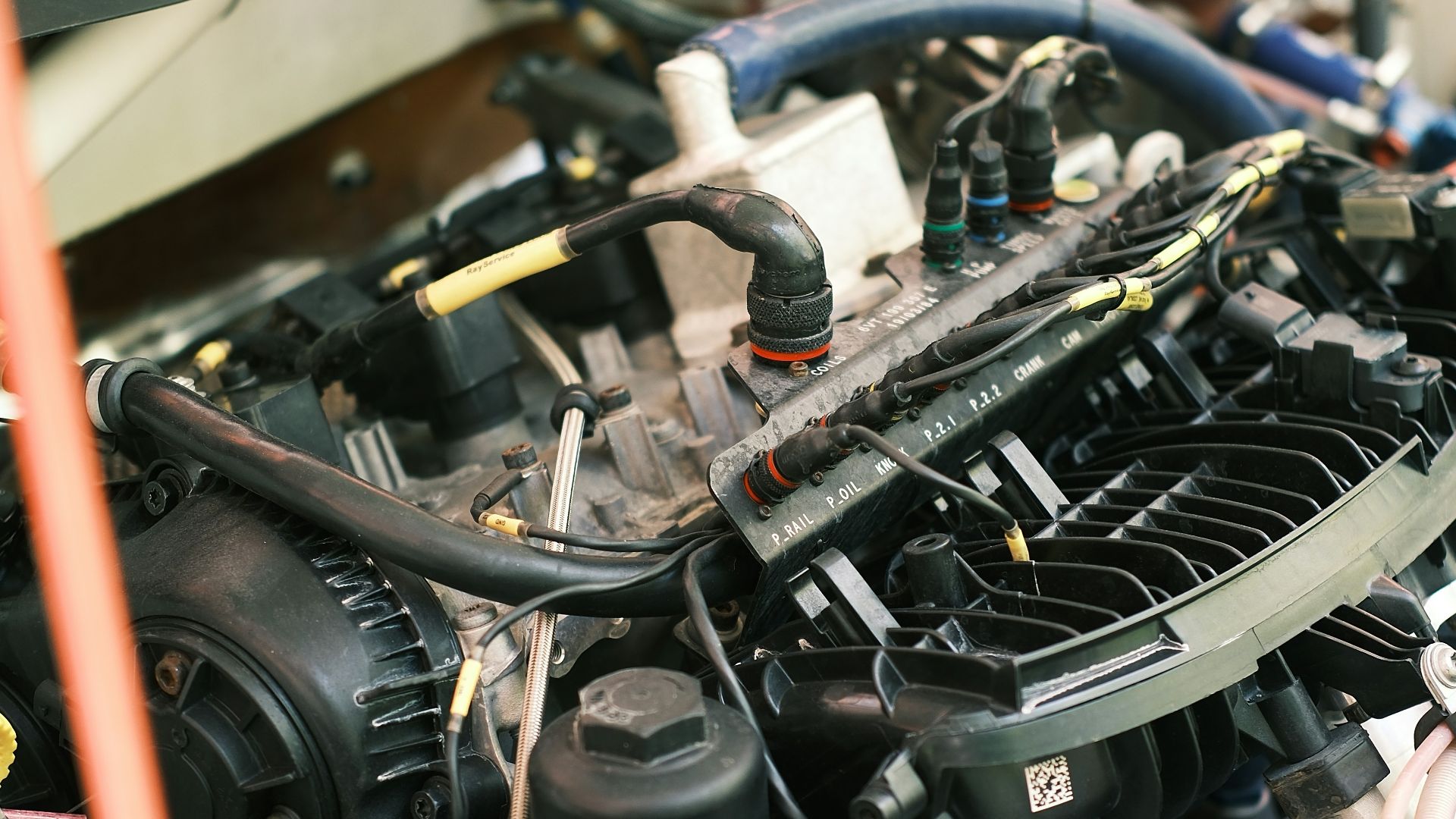 the engine compartment of a car with the hood open