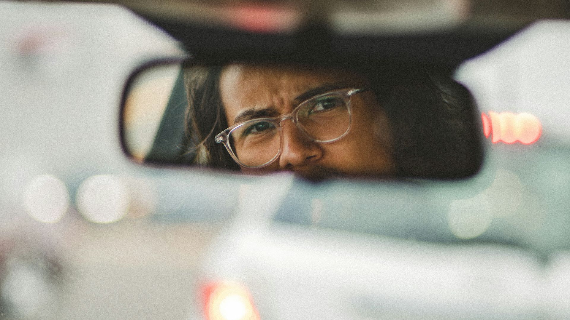man in black framed eyeglasses
