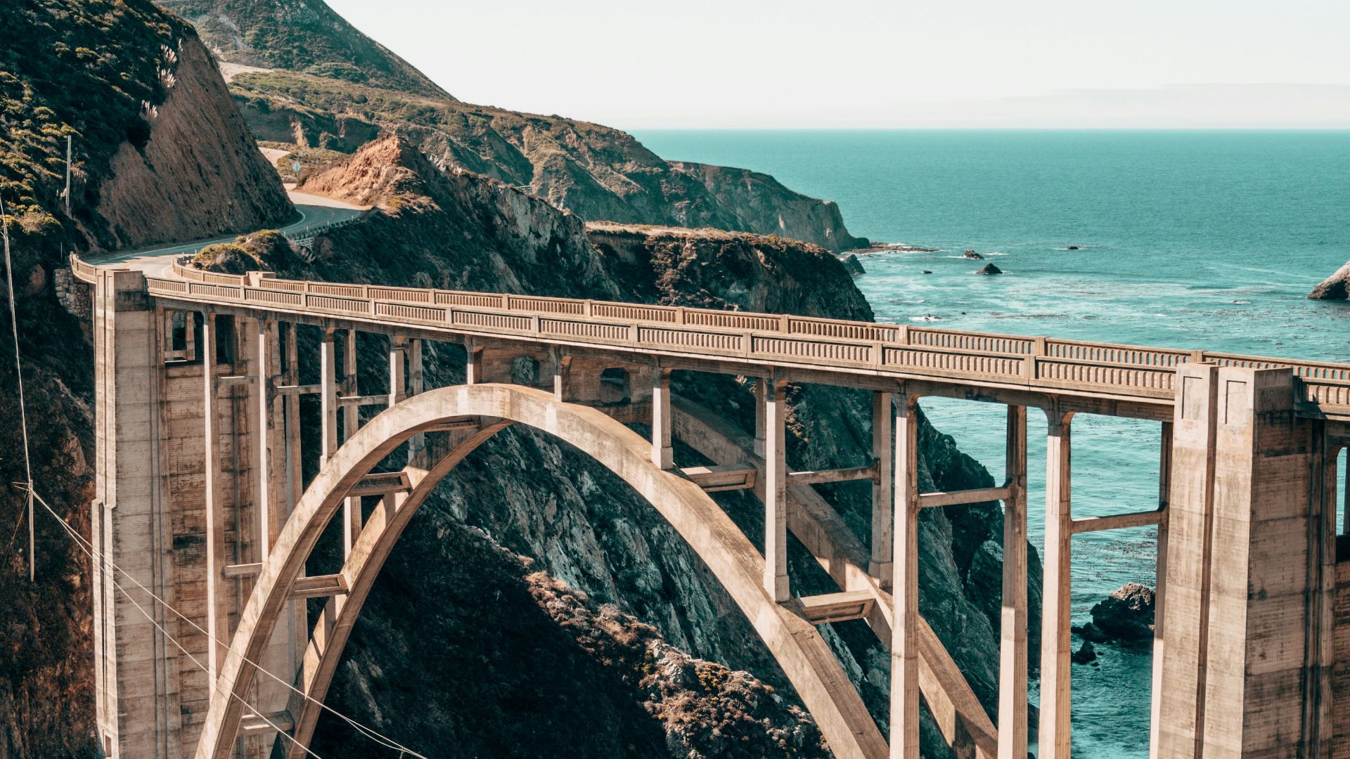 landscape photography of gray concrete bridge