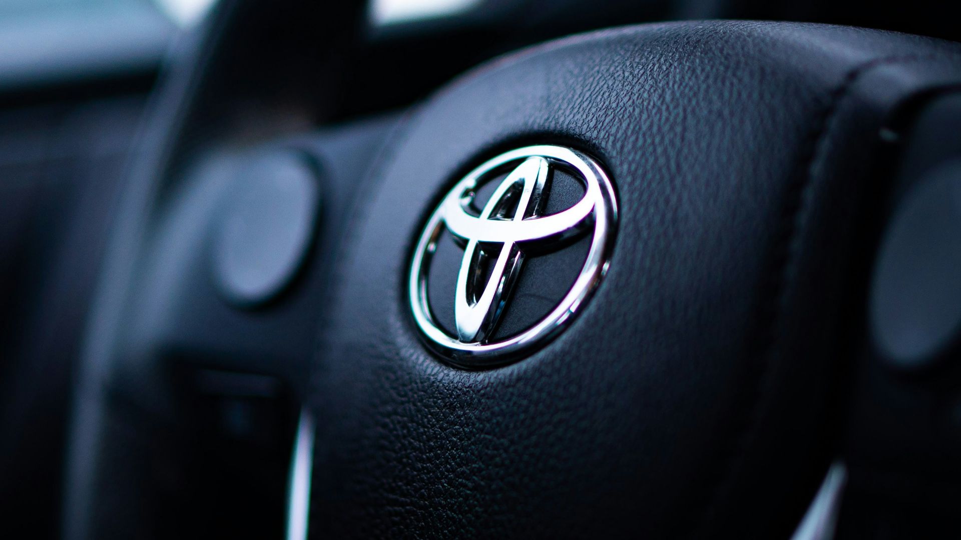 black toyota car steering wheel