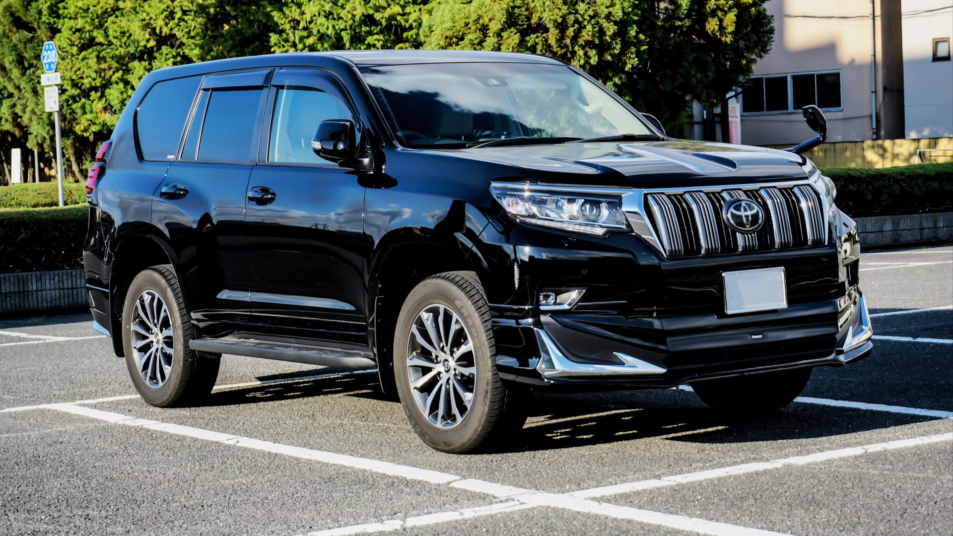 blue audi suv on road during daytime