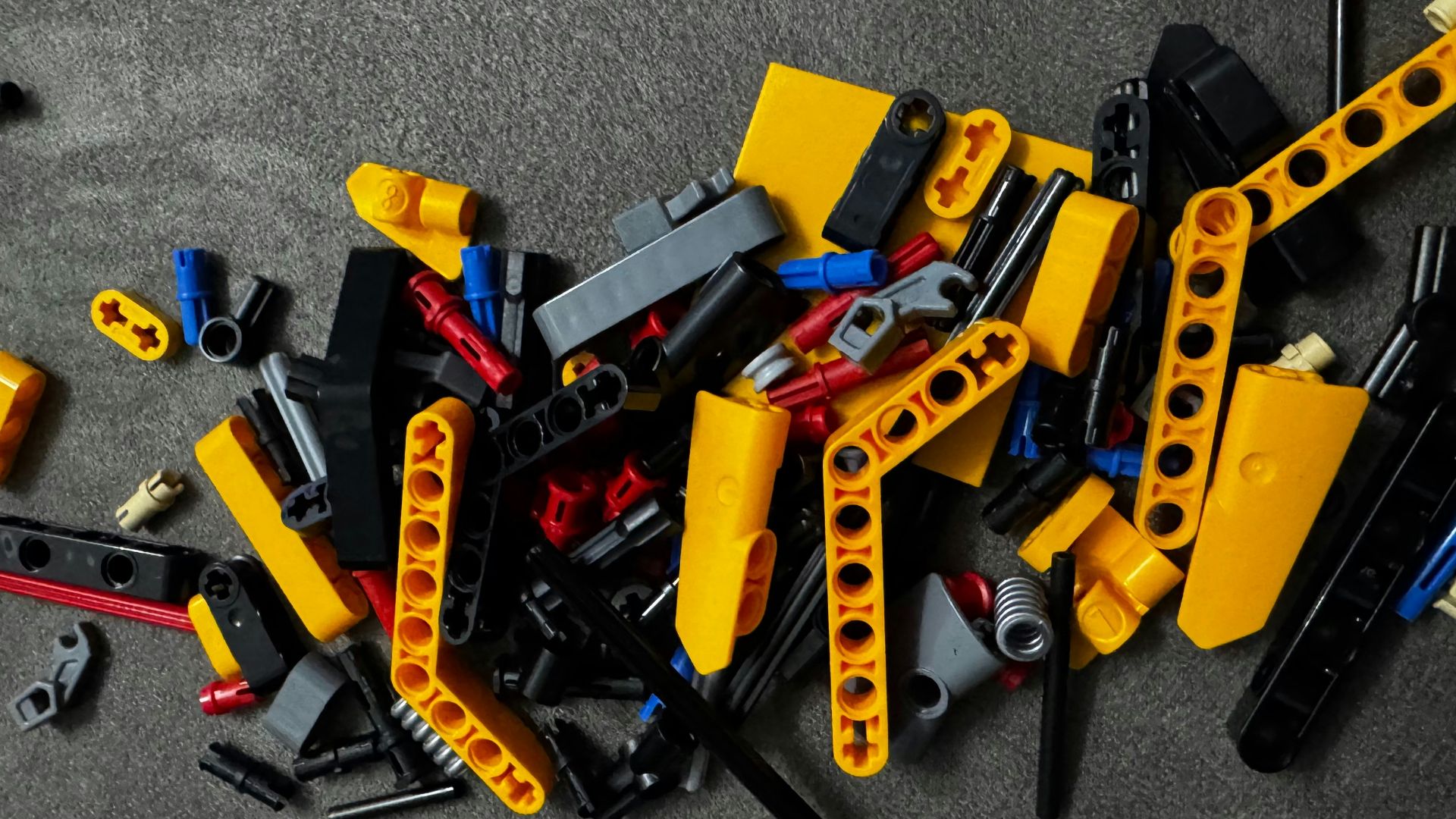 A pile of construction tools sitting on top of a floor