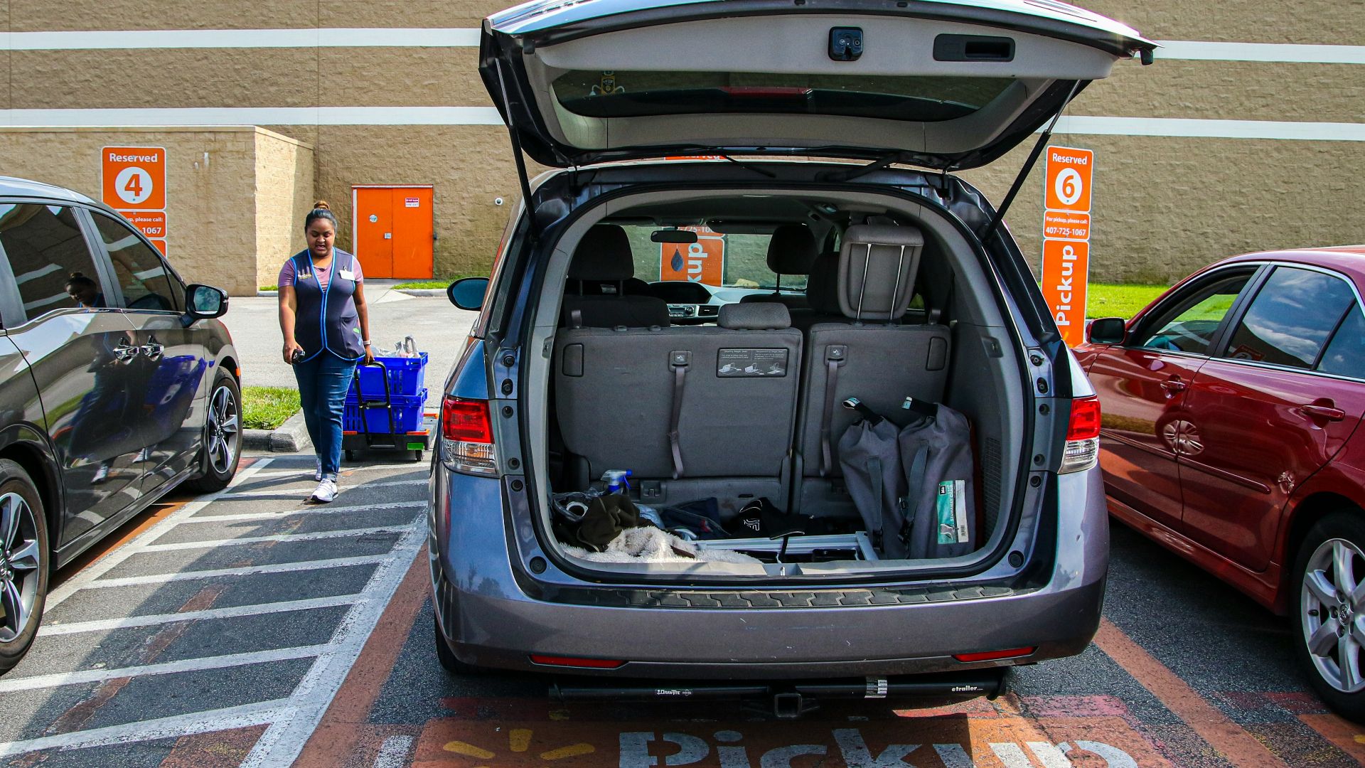 black car on pedestrian lane during daytime