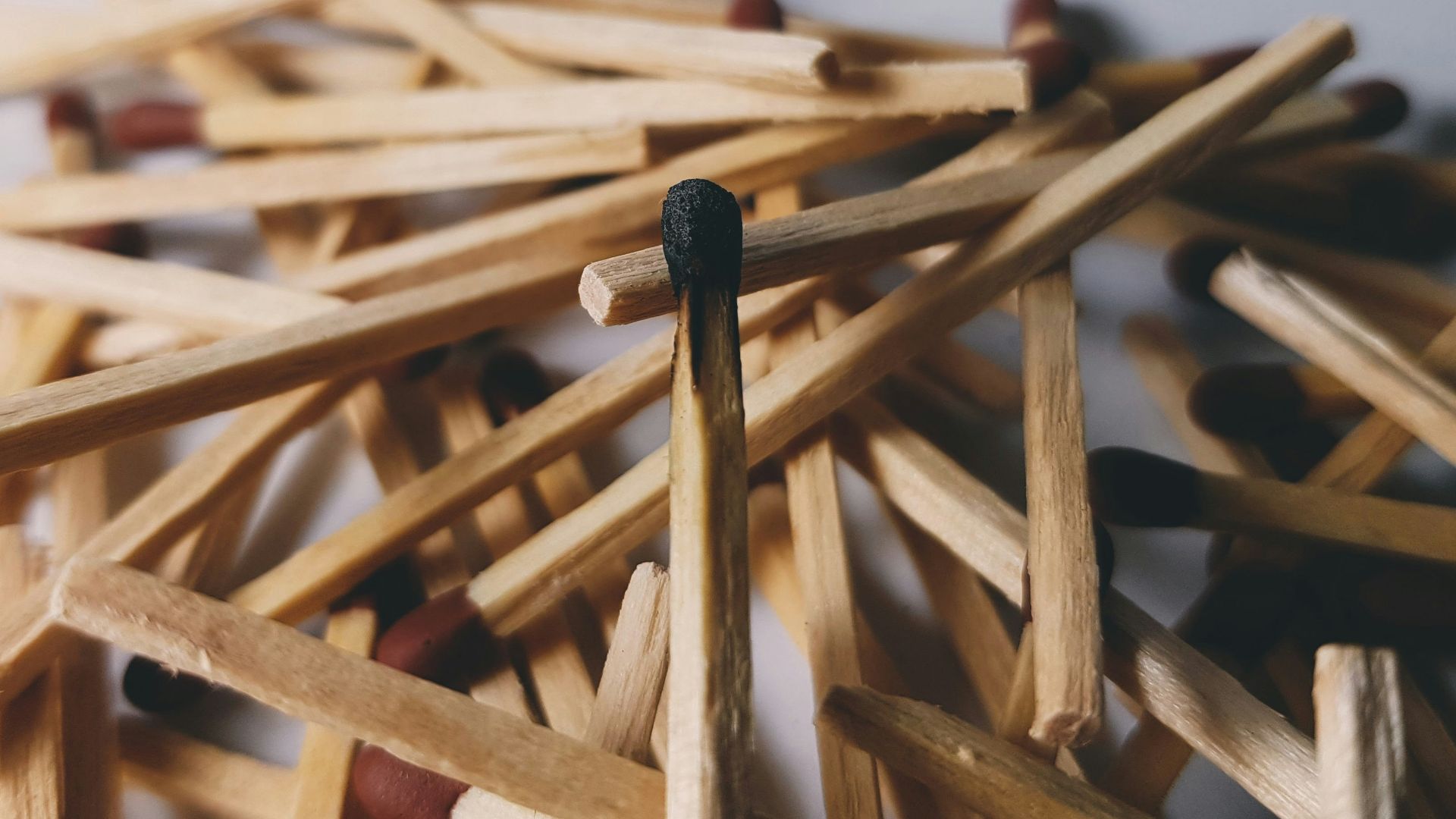 brown wooden sticks on white surface
