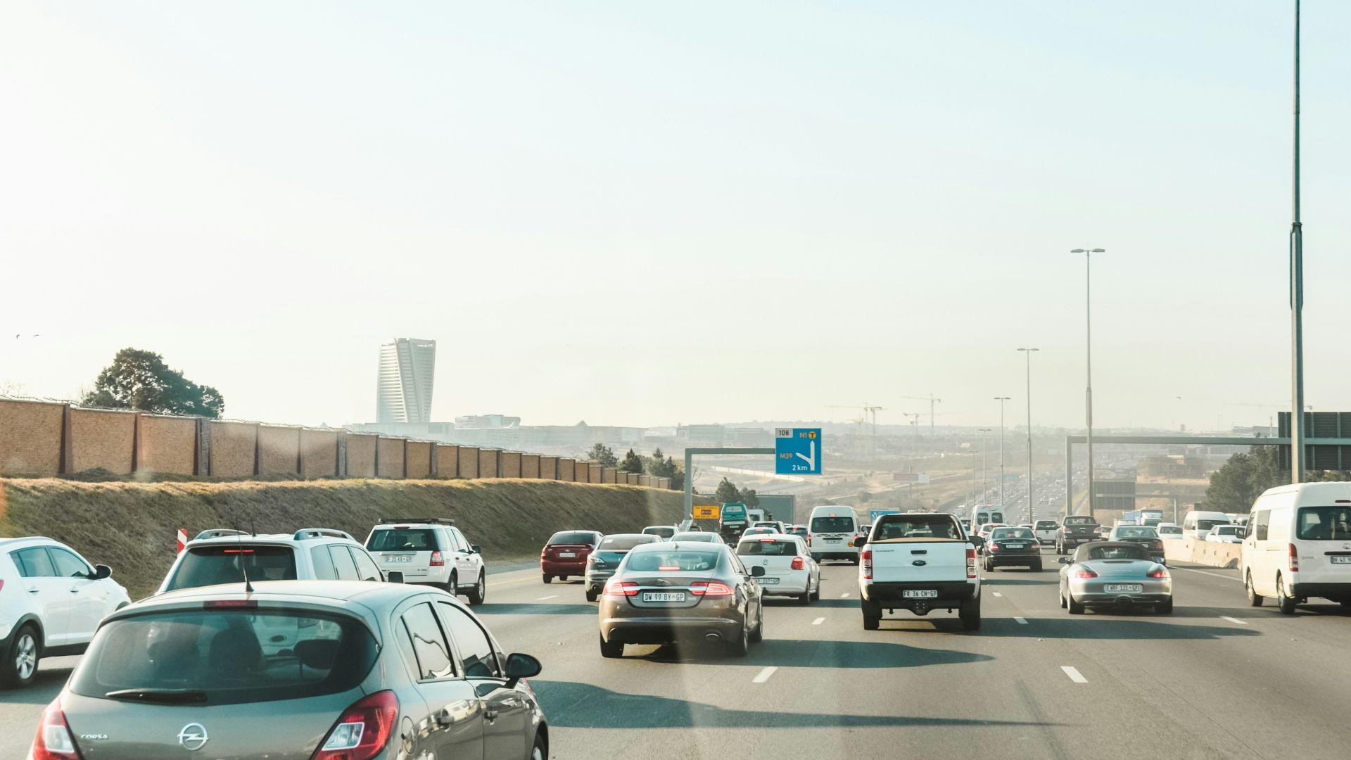 cars parked on parking lot during daytime