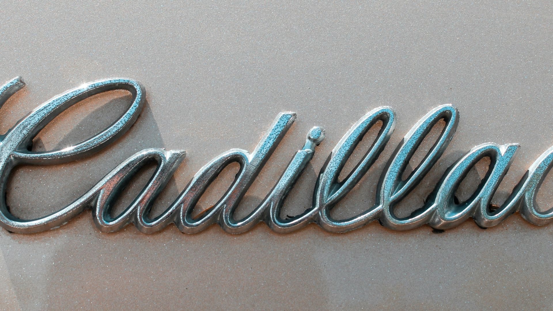 silver and diamond ring on white table