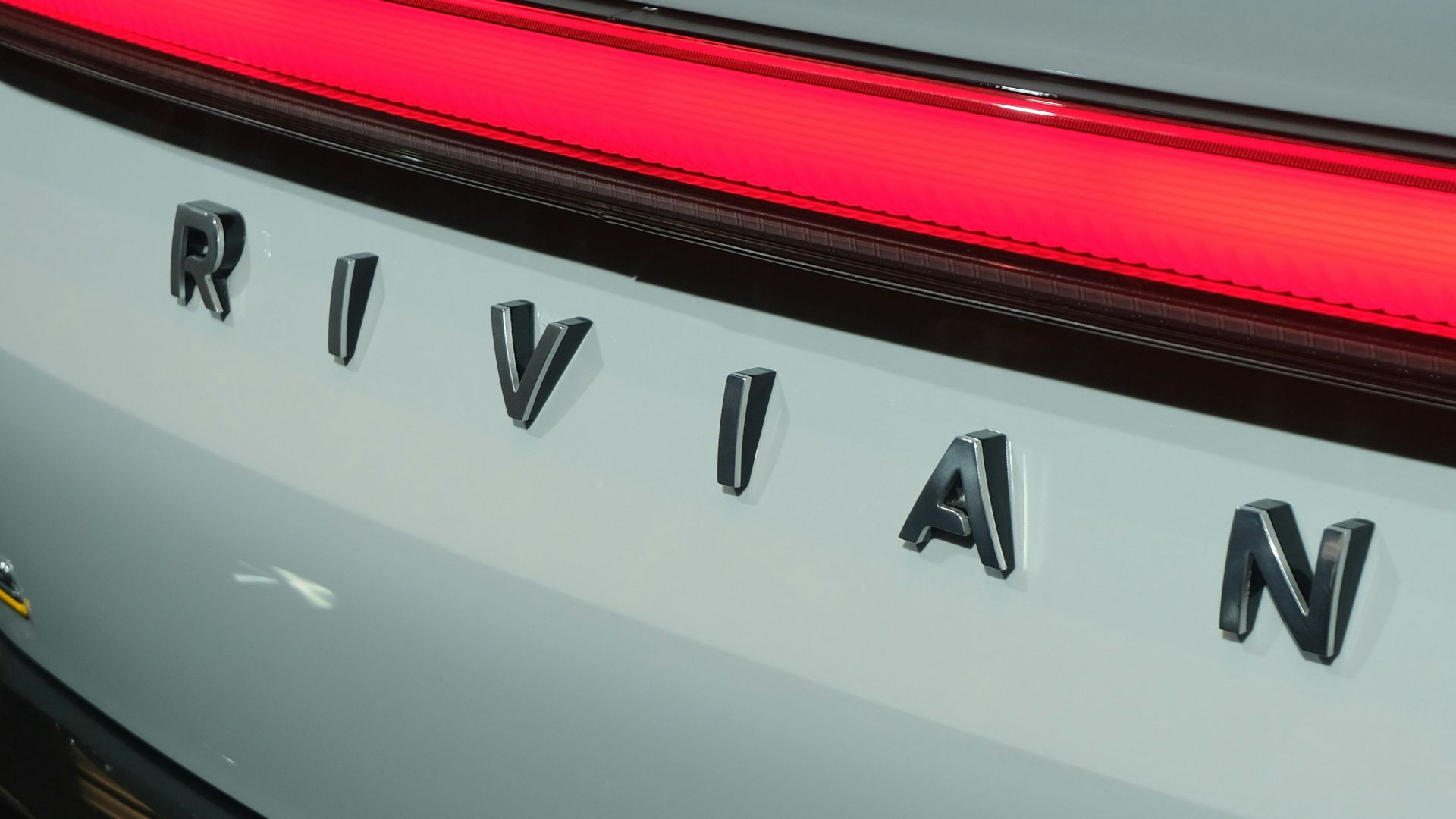 A close up of the rear of a white car