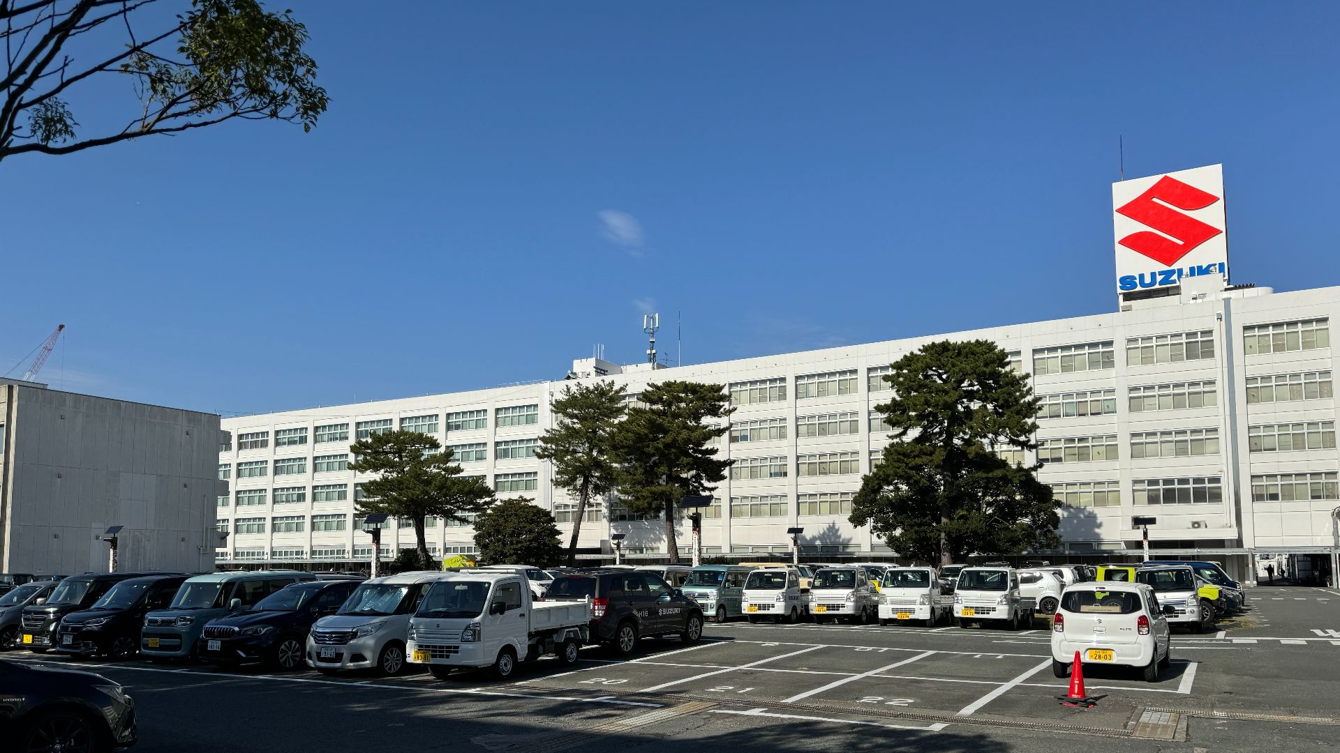 File:Suzuki HQ and parking lot (2024).jpg