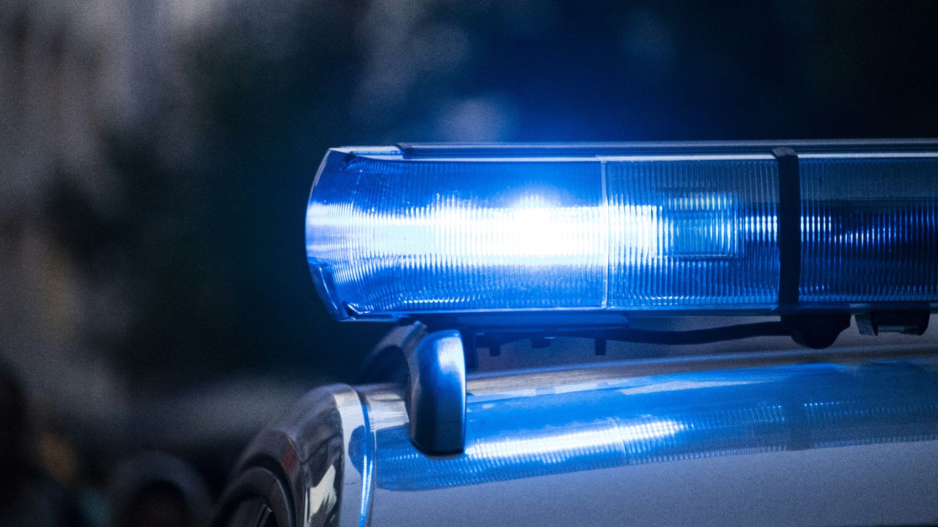 a close up of a police car with its lights on