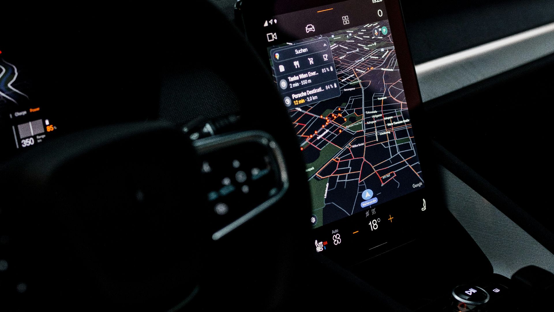 the dashboard of a car with a gps device