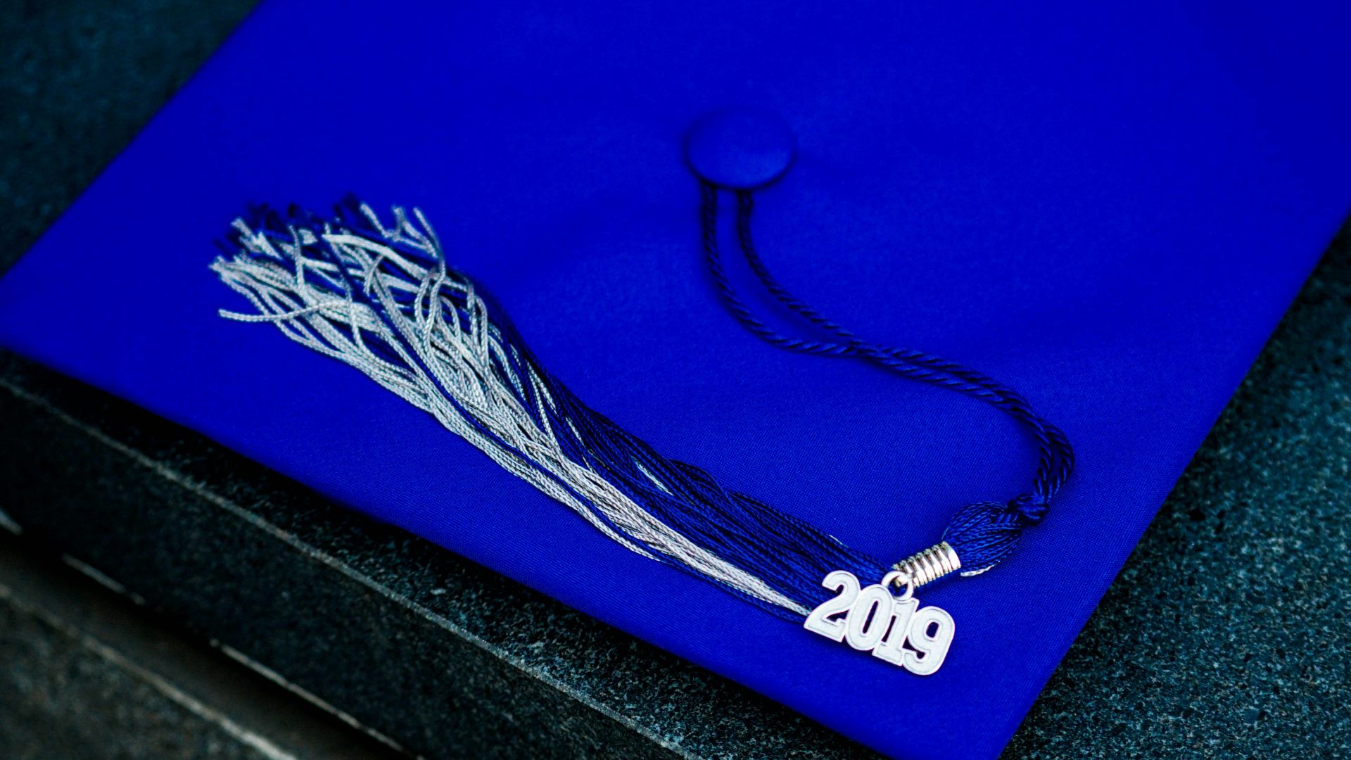 blue and white academic hat