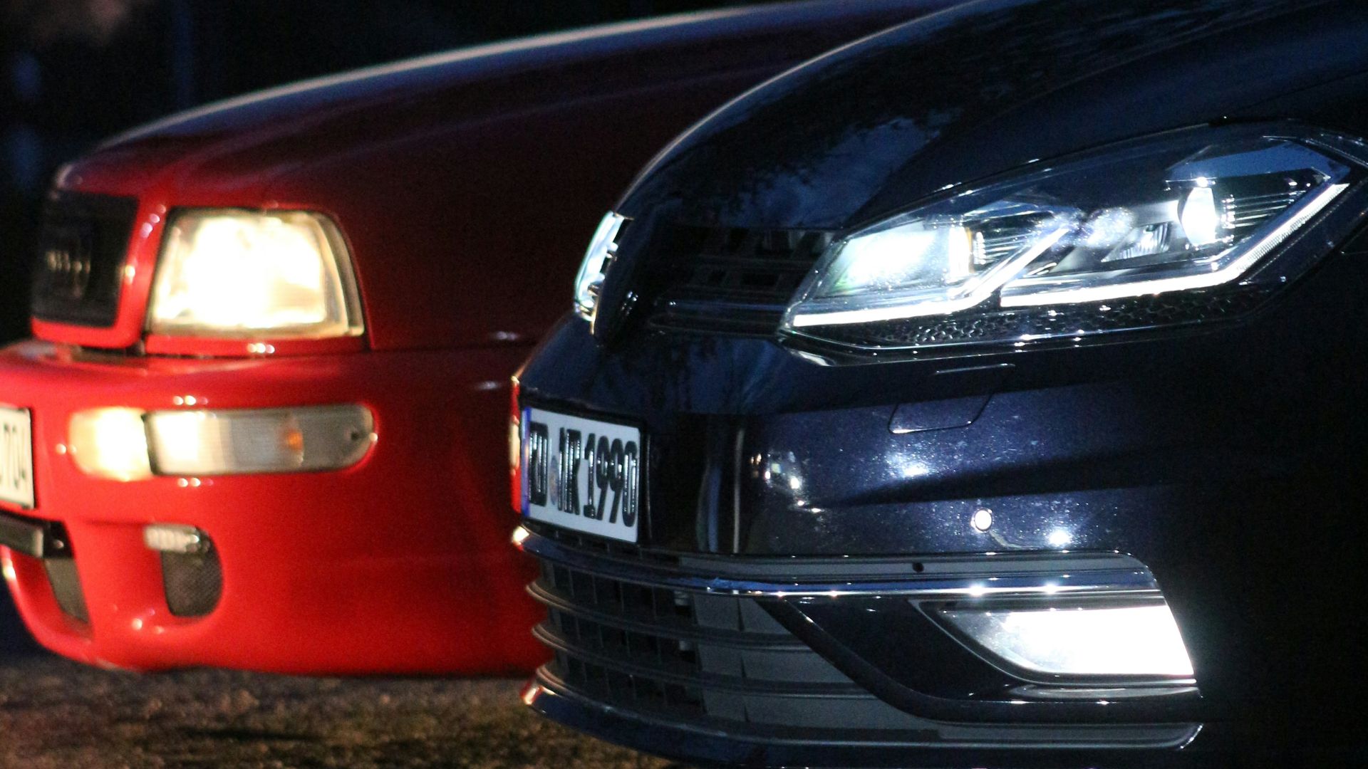 a couple of cars parked next to each other