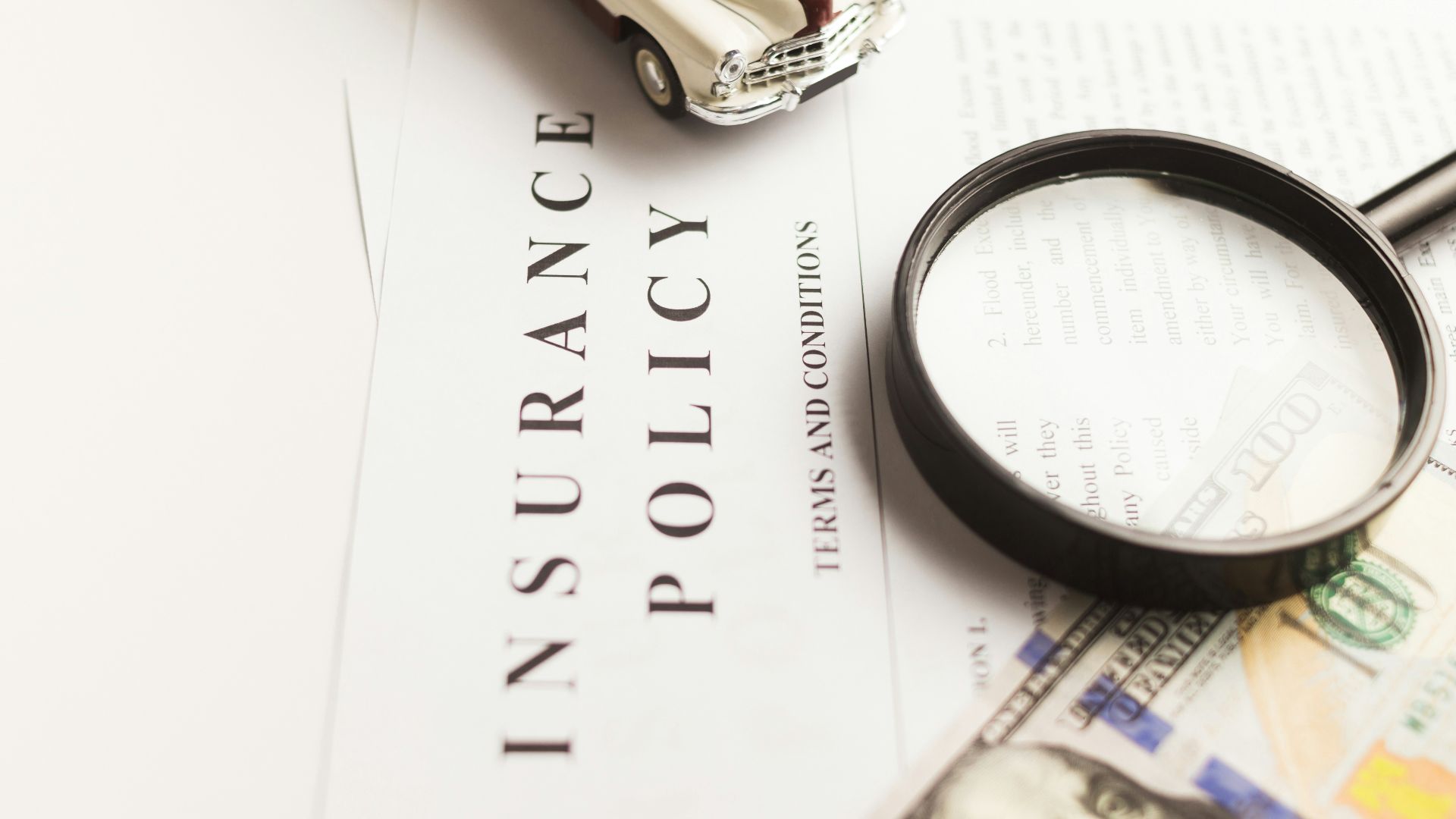 a magnifying glass sitting on top of a piece of paper