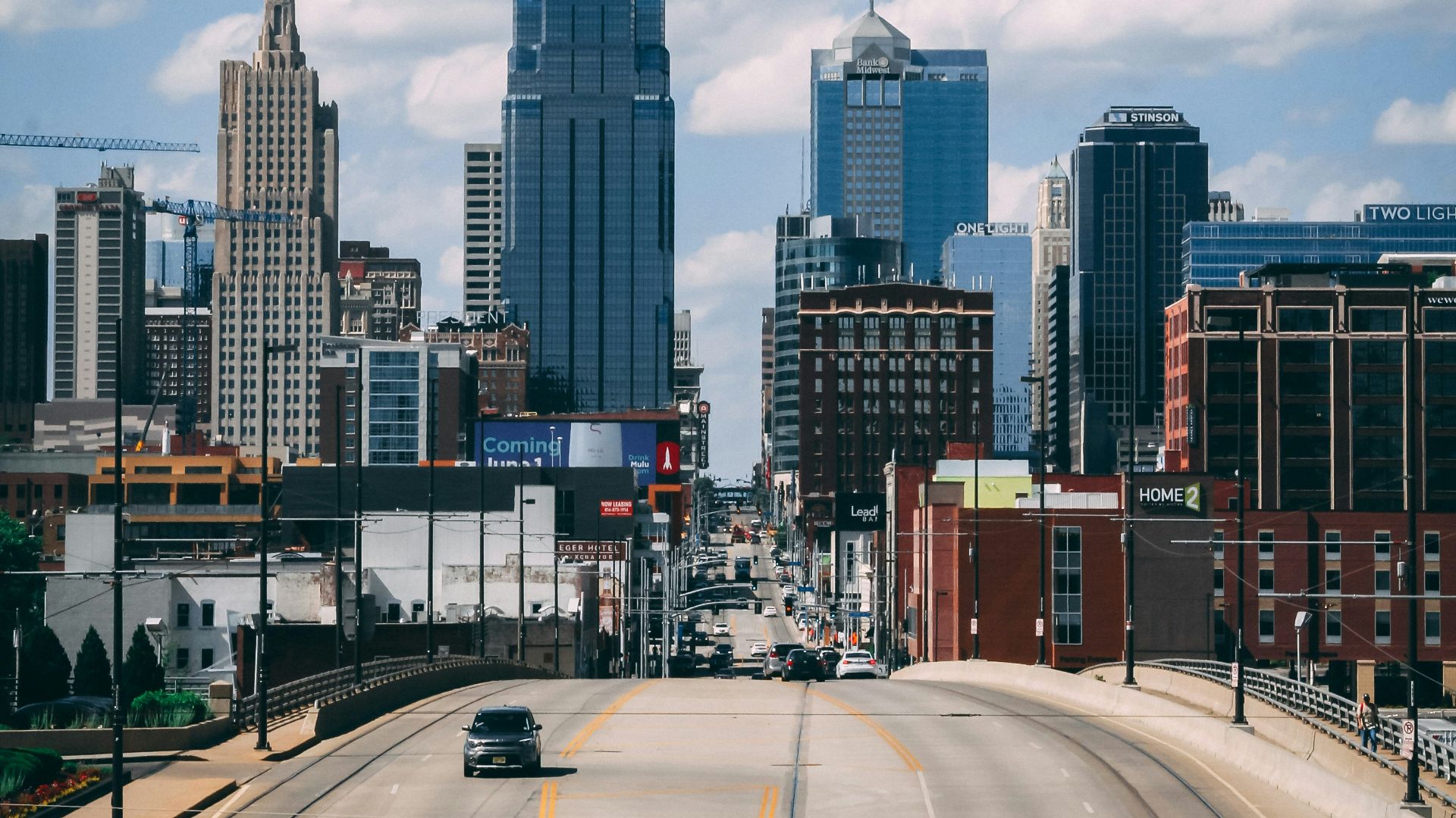 a city street with tall buildings