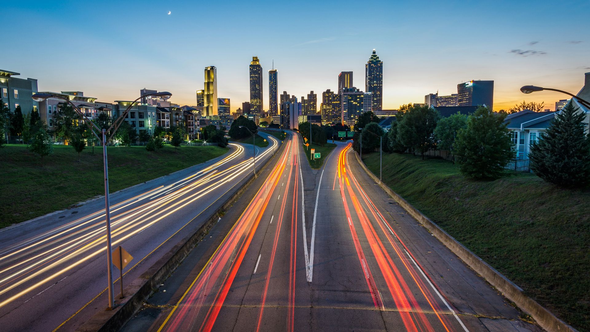 timelapse photo of highway during golden hour
