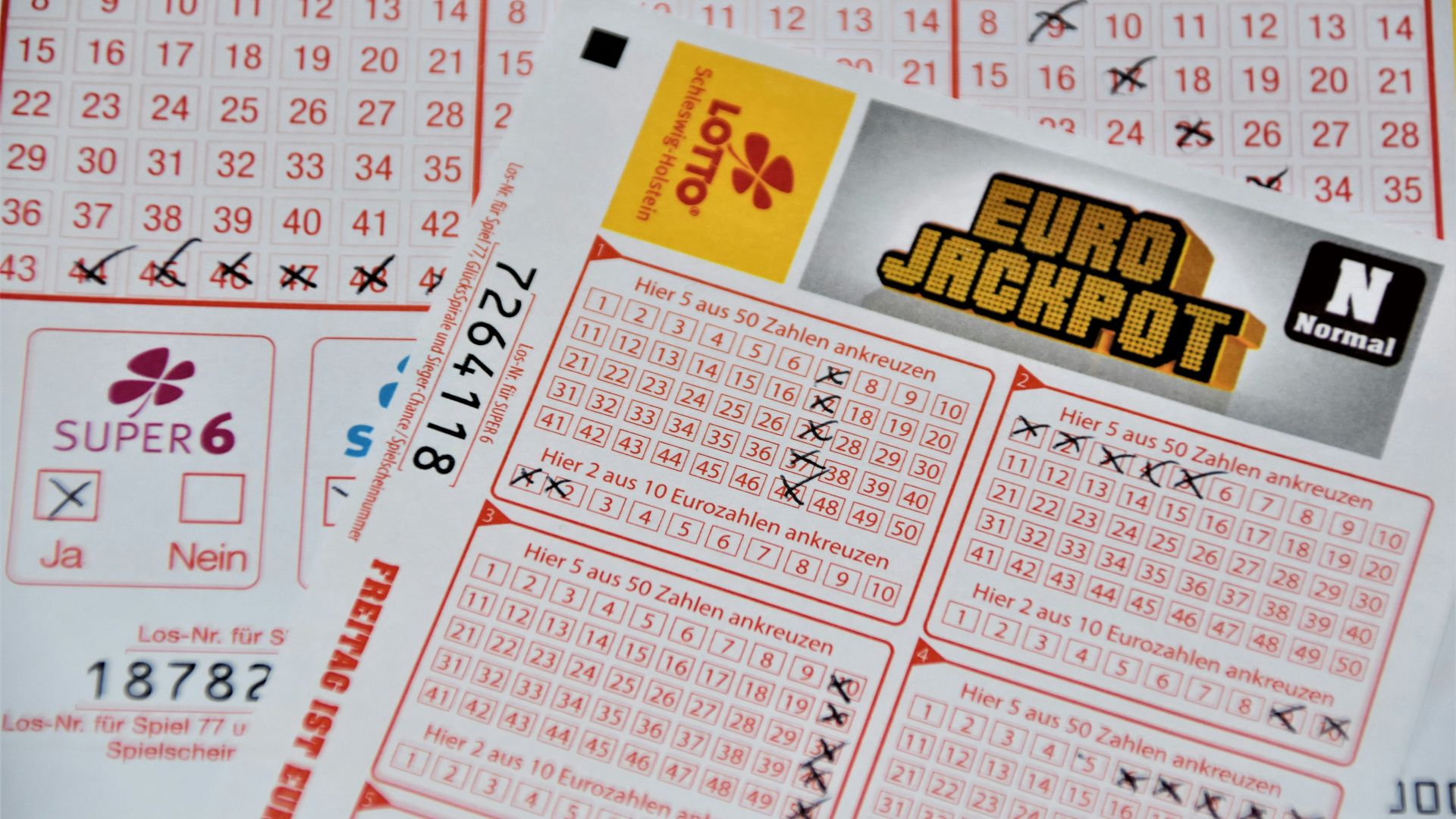 white and red calendar on white wall