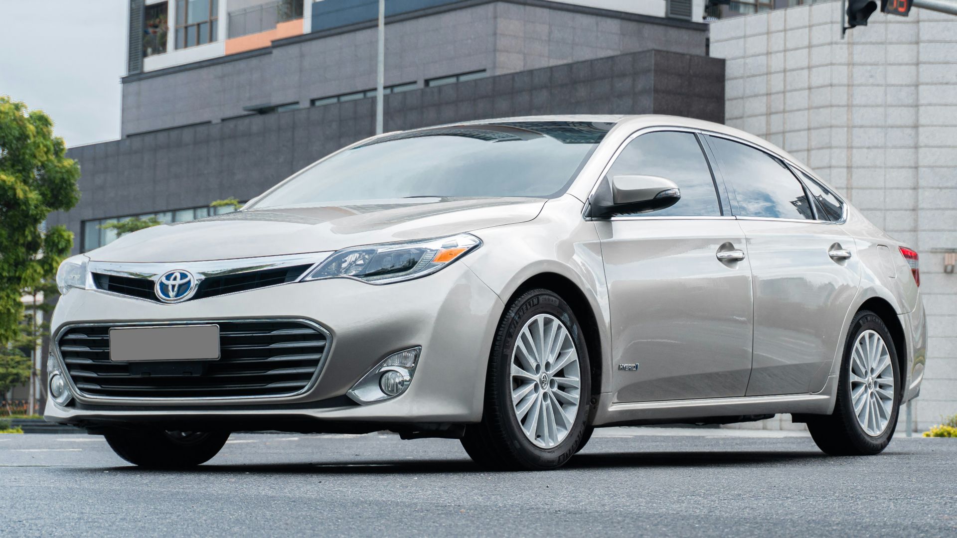 a silver car parked on the side of a road