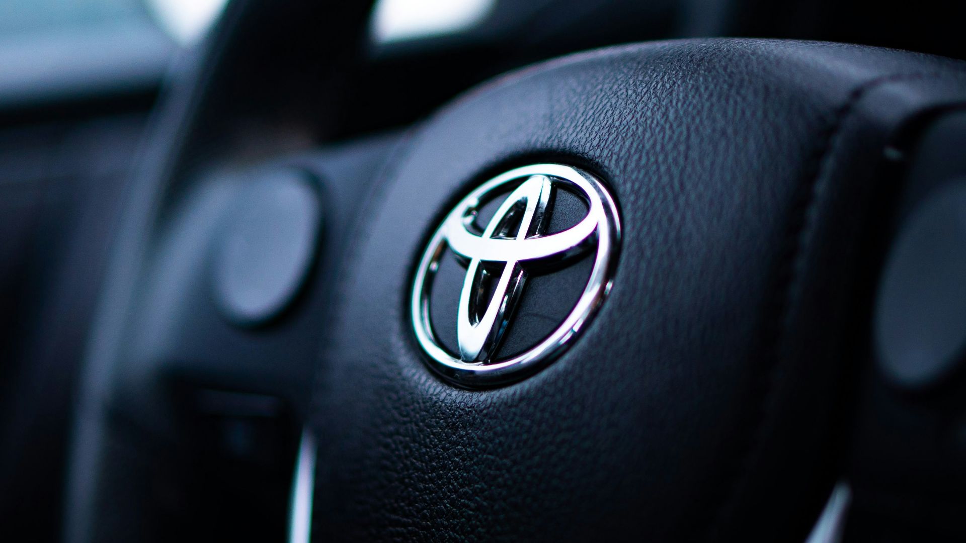 black toyota car steering wheel