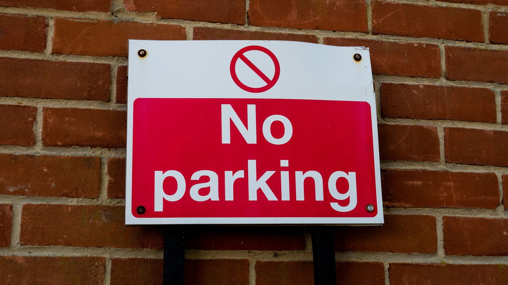 white and black no smoking sign