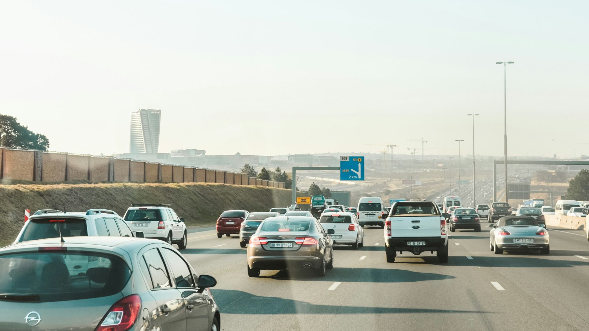 cars parked on parking lot during daytime