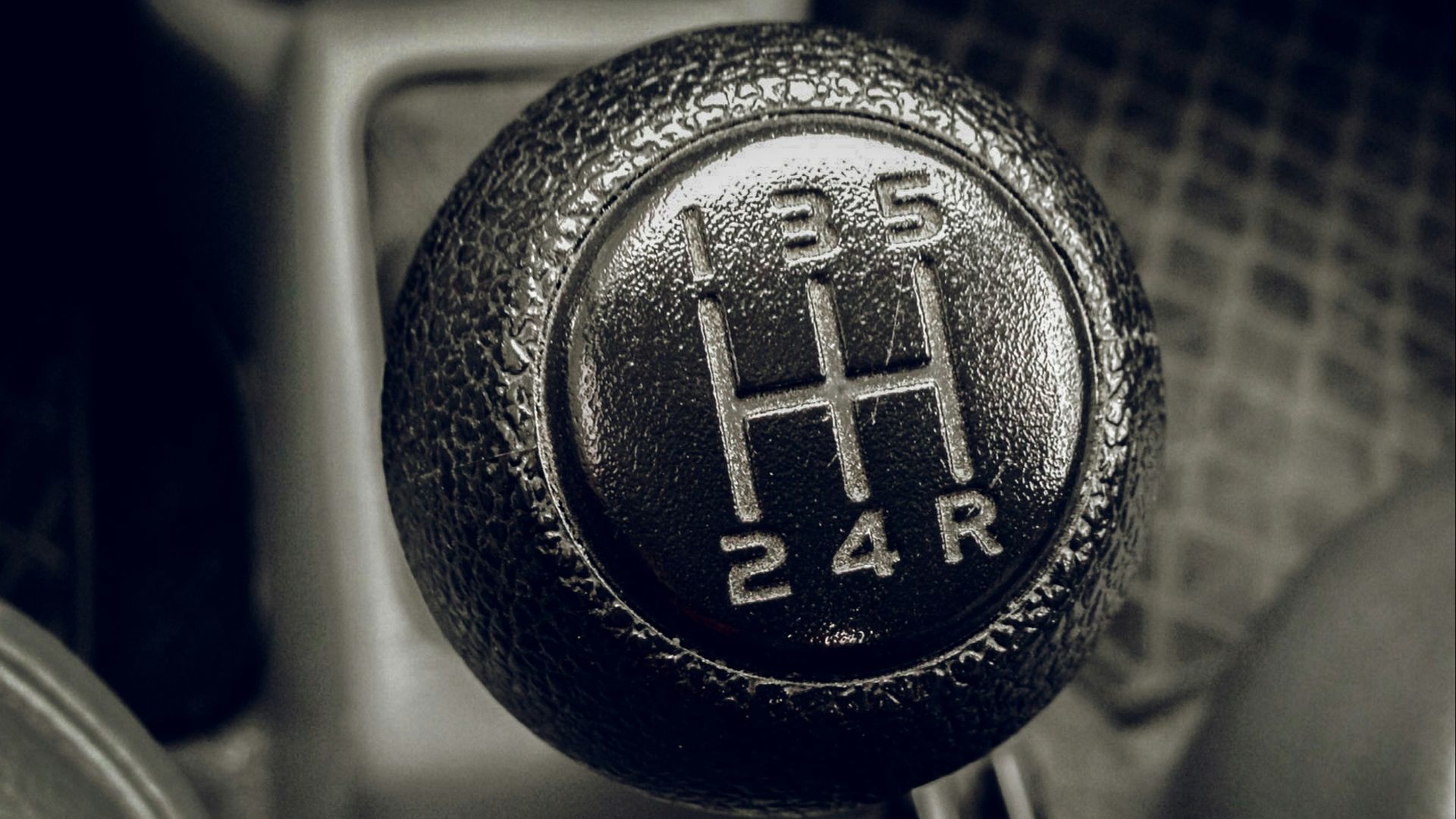 a close up of a car's gear stick