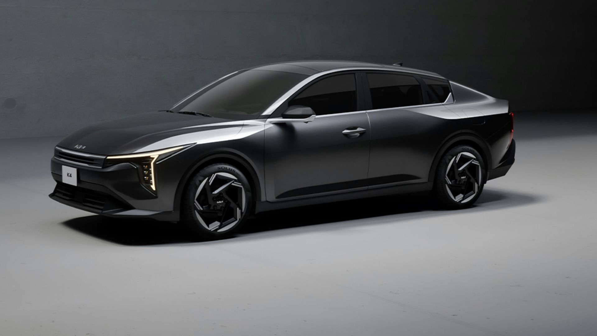 a car is shown in a dimly lit room