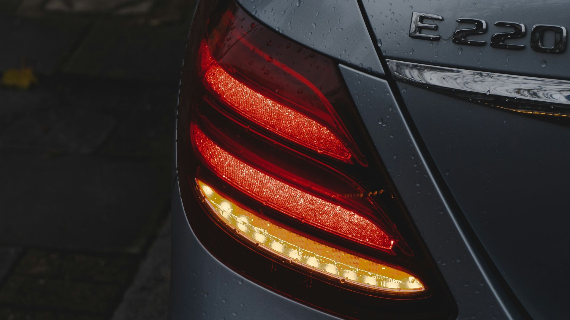 black car on gray concrete road