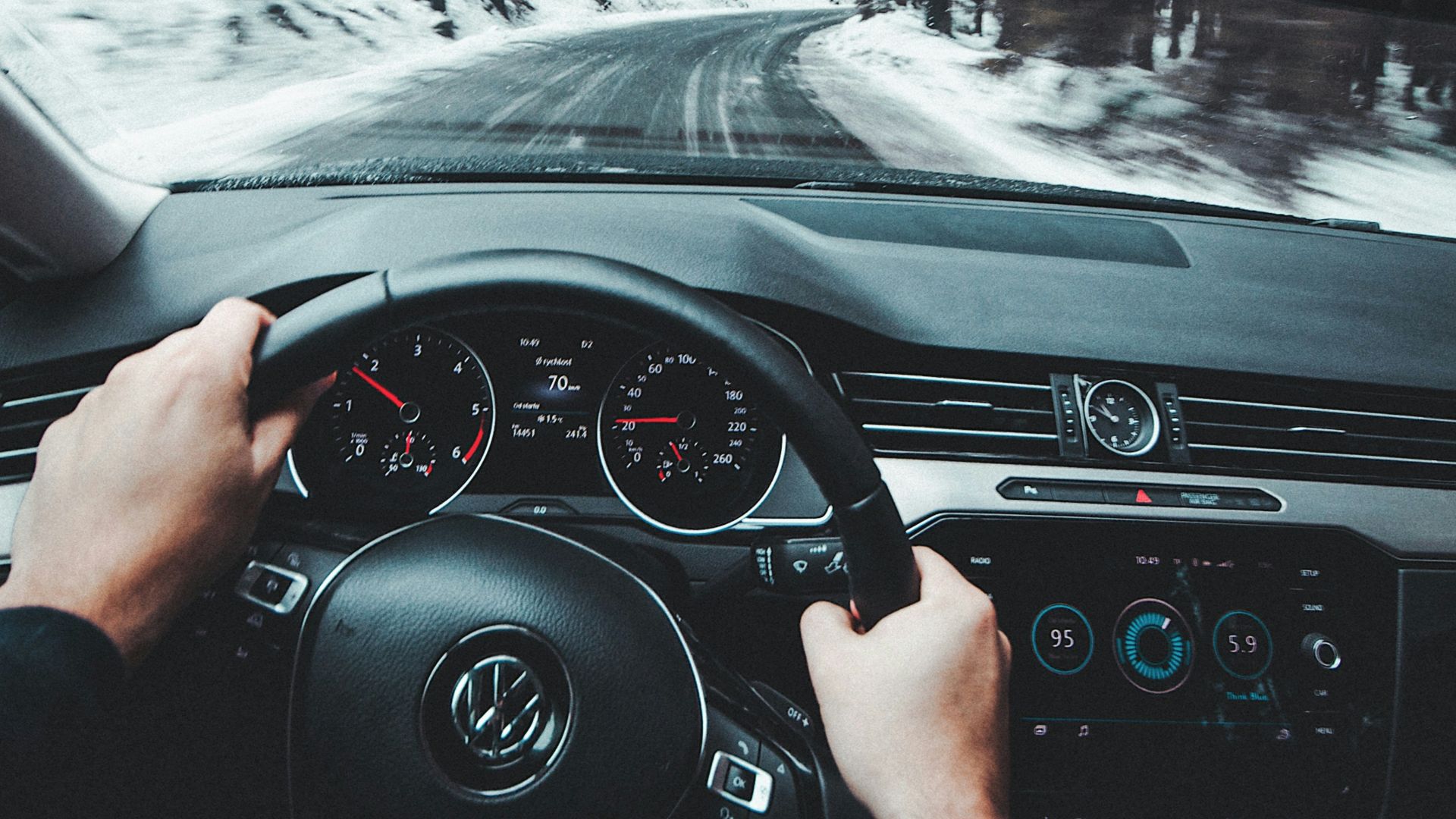 person driving Volkswagen vehicle