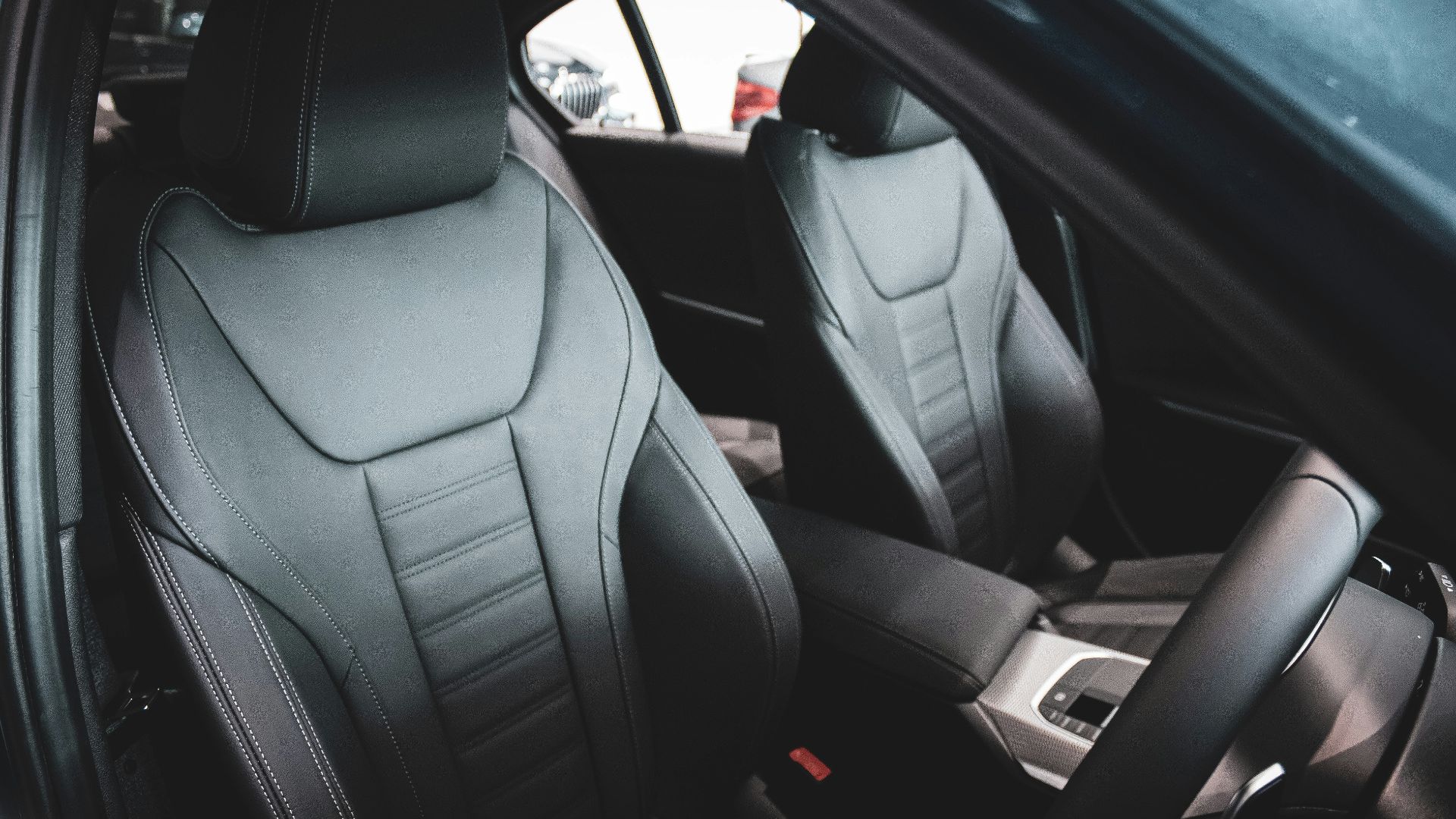 black leather car seat in car