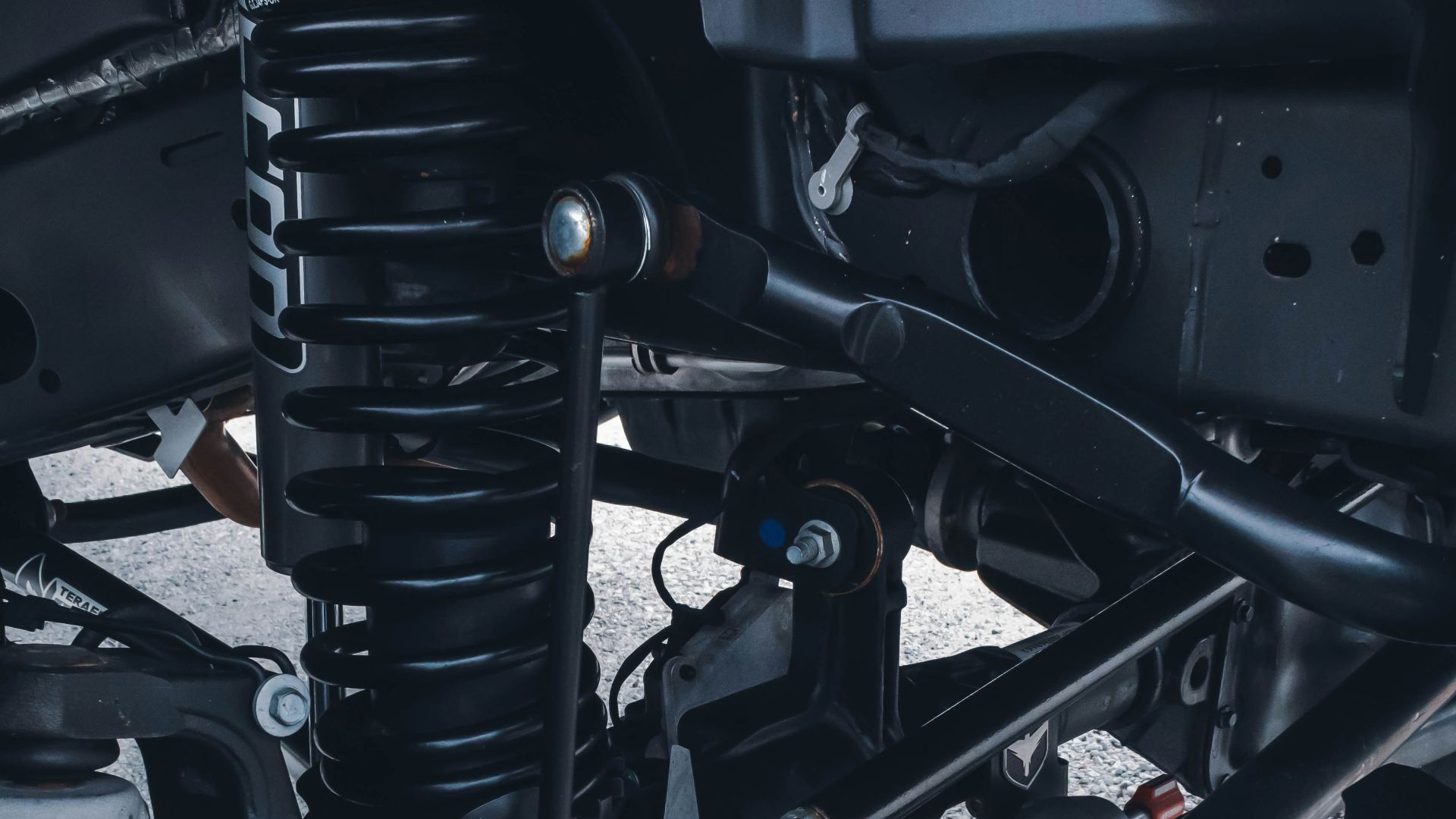 a close up of the front suspension of a motorcycle