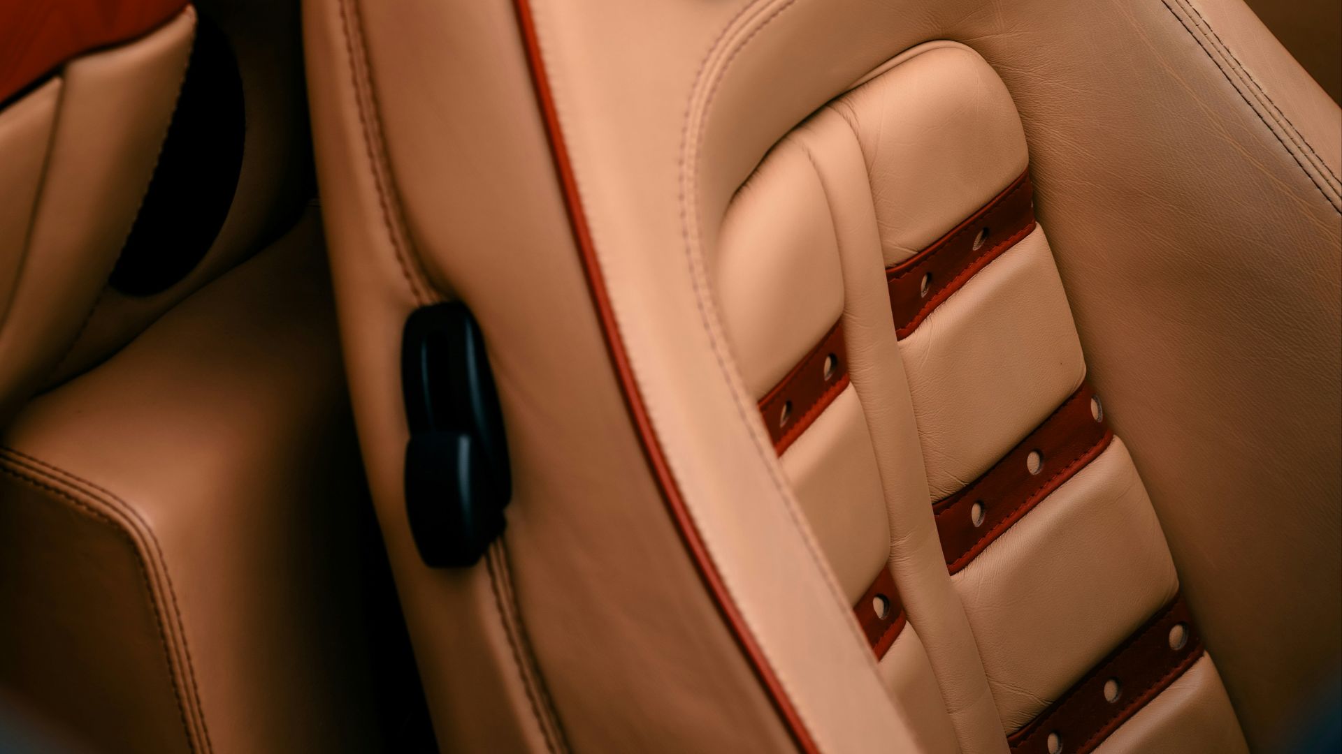 The interior of a car with a steering wheel