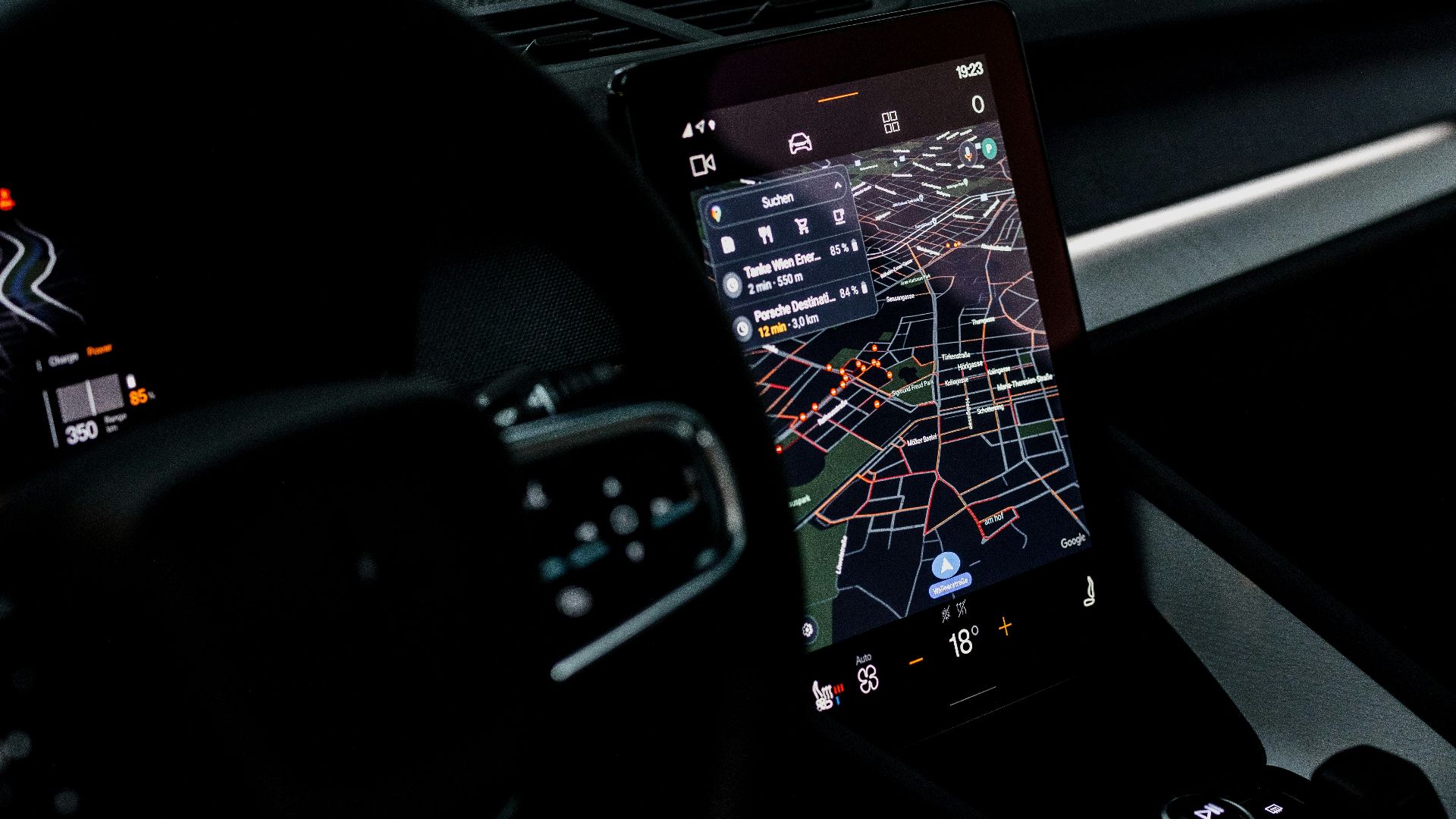 the dashboard of a car with a gps device