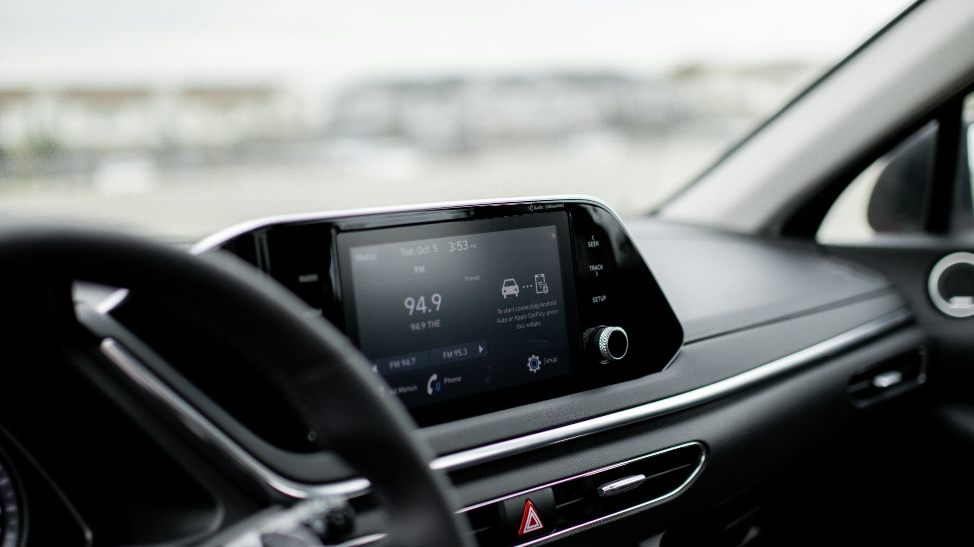a view of a car dashboard from inside the vehicle