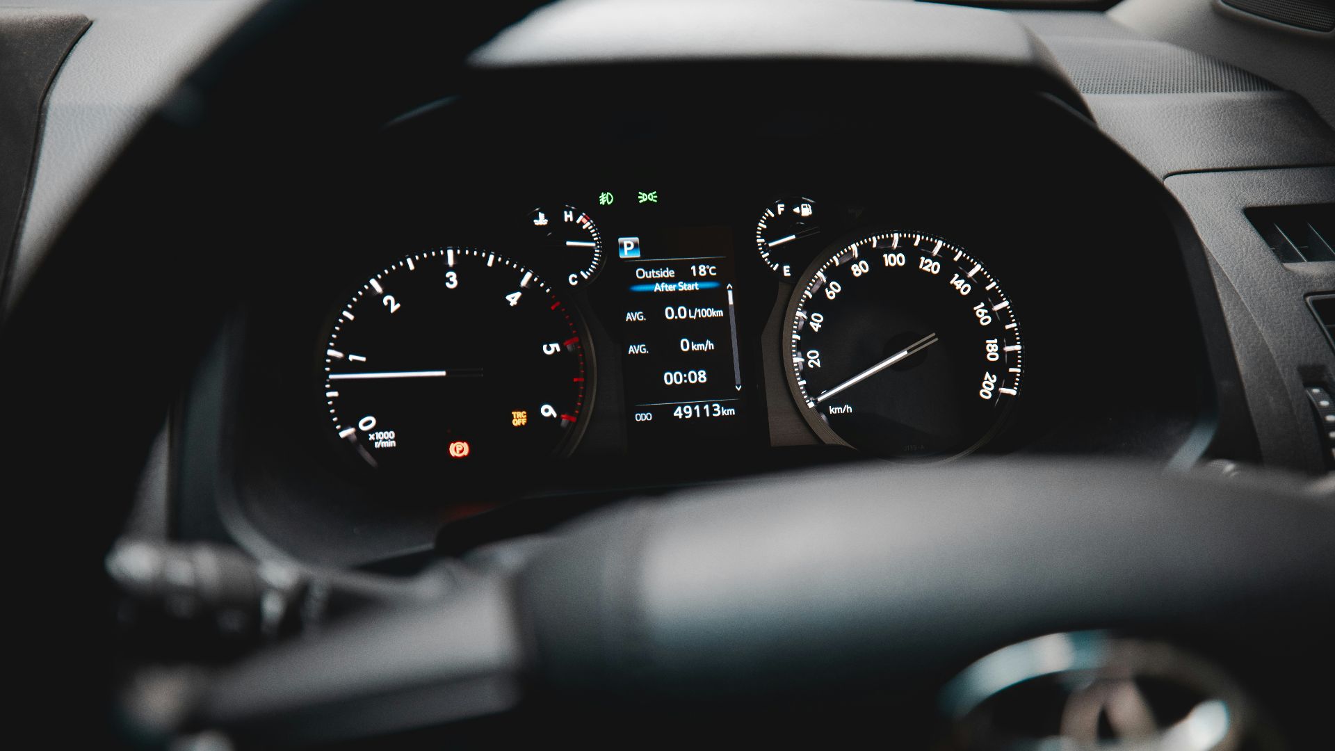 black and white car instrument panel cluster