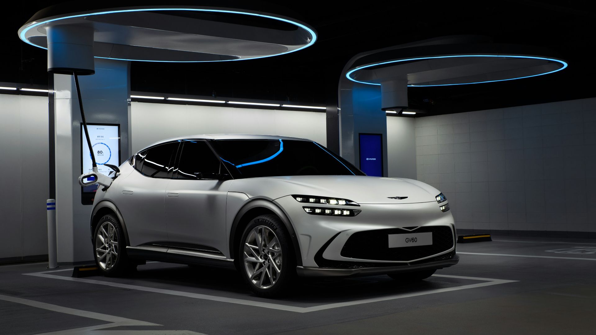 a white sports car in a showroom