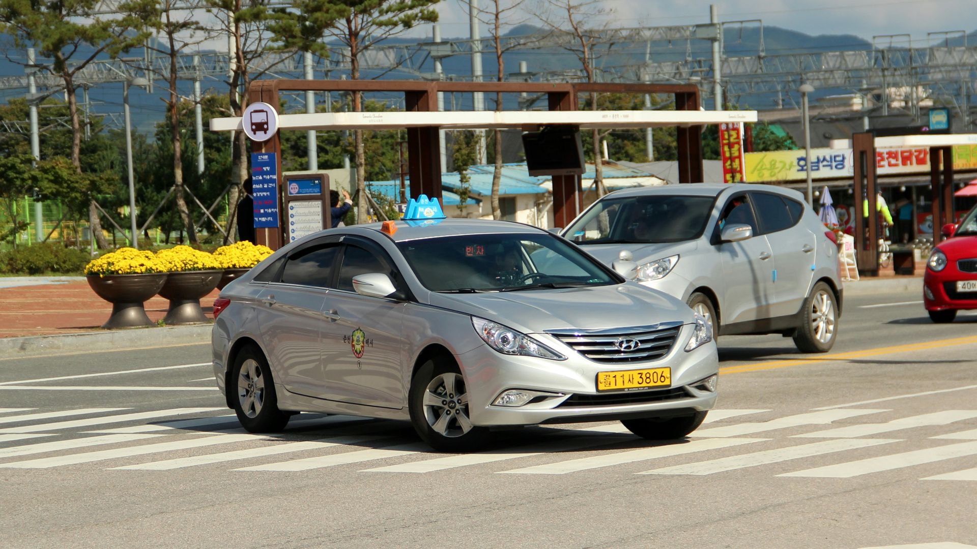 silver mercedes benz coupe on road during daytime