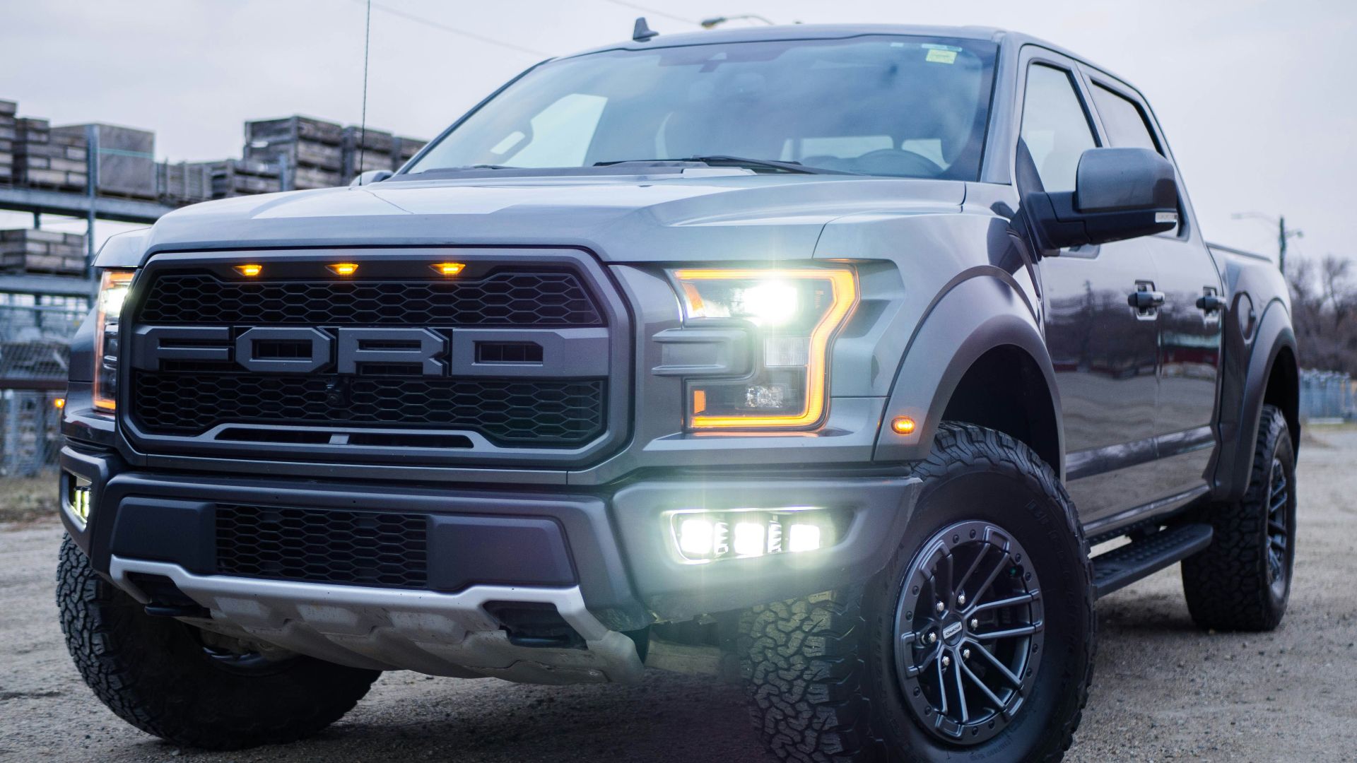 black chevrolet crew cab pickup truck on road during daytime
