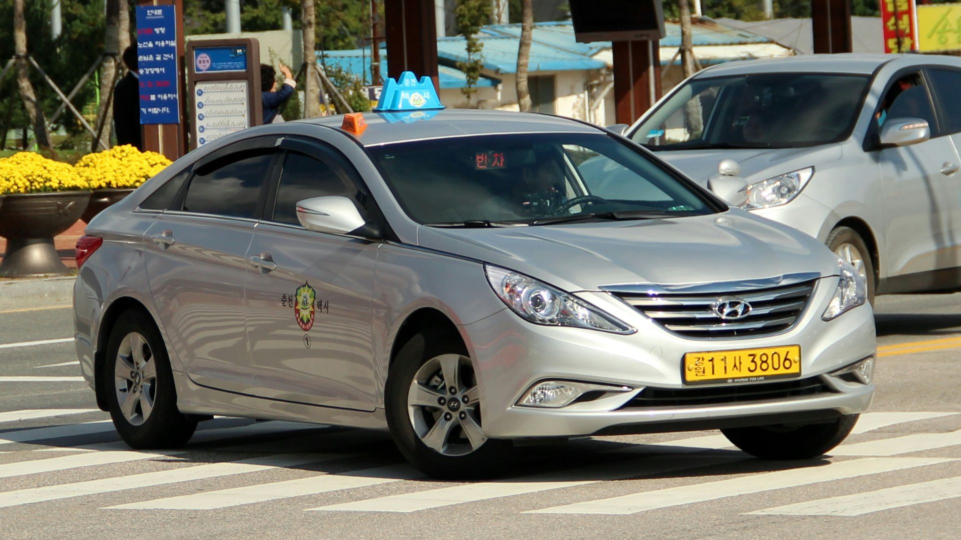 silver mercedes benz coupe on road during daytime