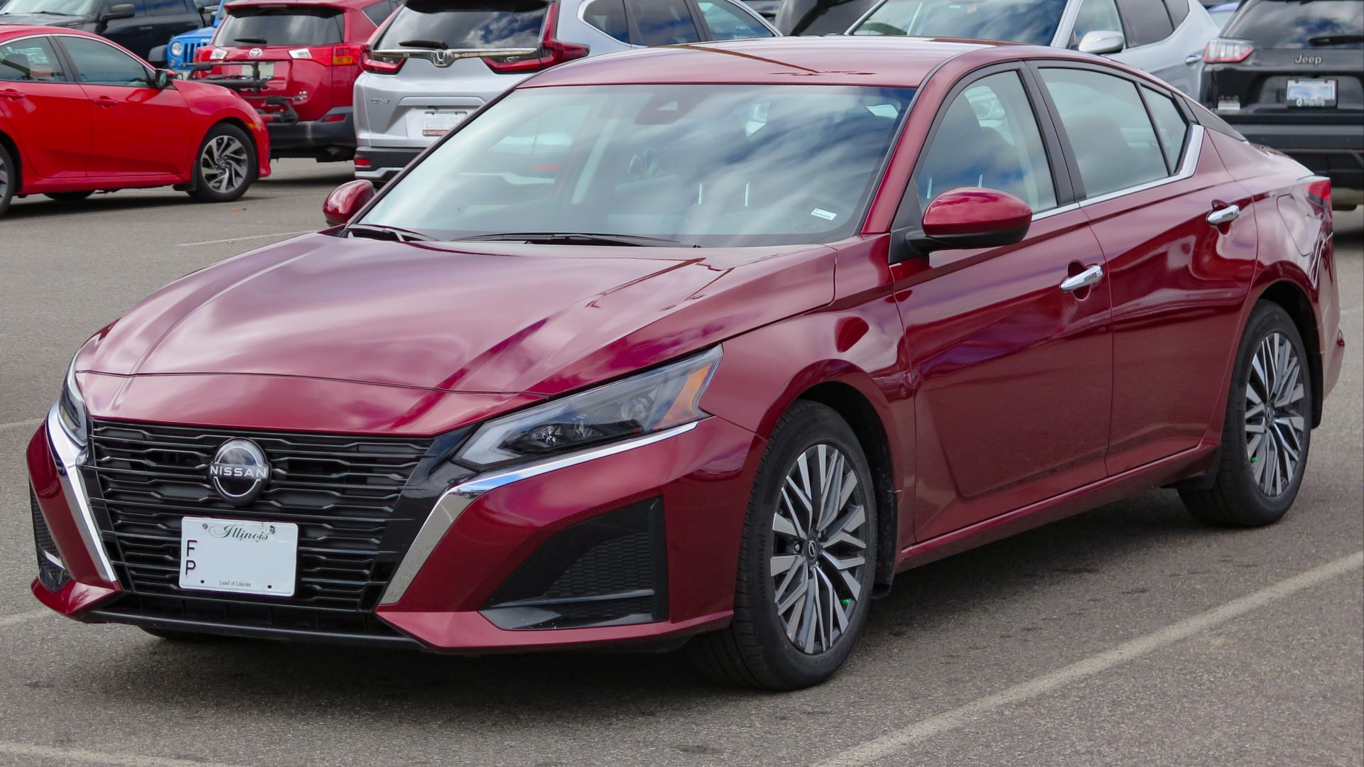 File:2023 Nissan Altima SV in Scarlet Ember Tintcoat, Front Left, 09-12-2023.jpg
