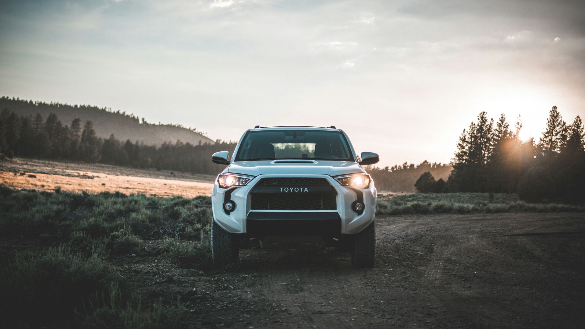 parked white Toyota vehicle