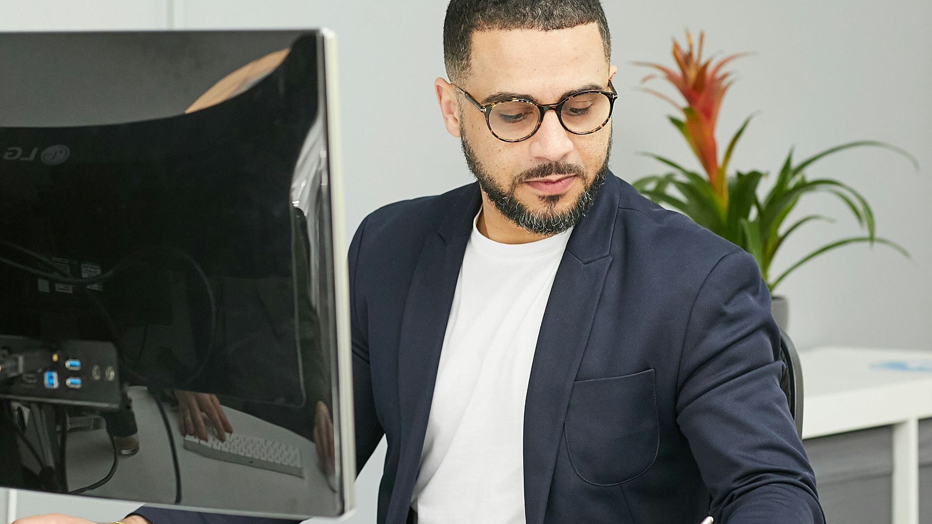 a man sitting at a desk