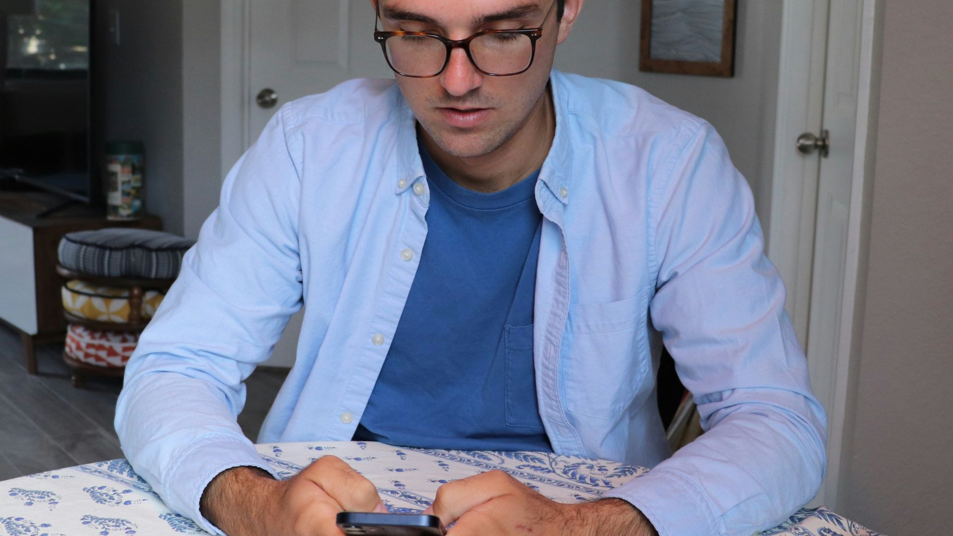 man in white dress shirt and blue necktie