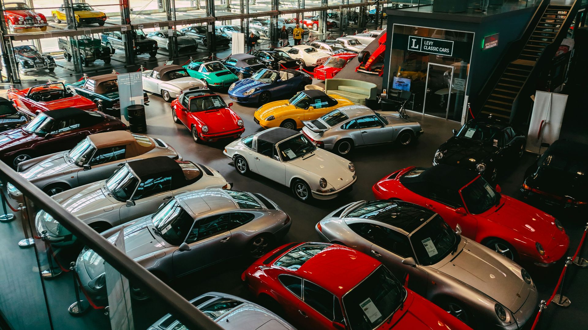 cars parked in front of building during daytime