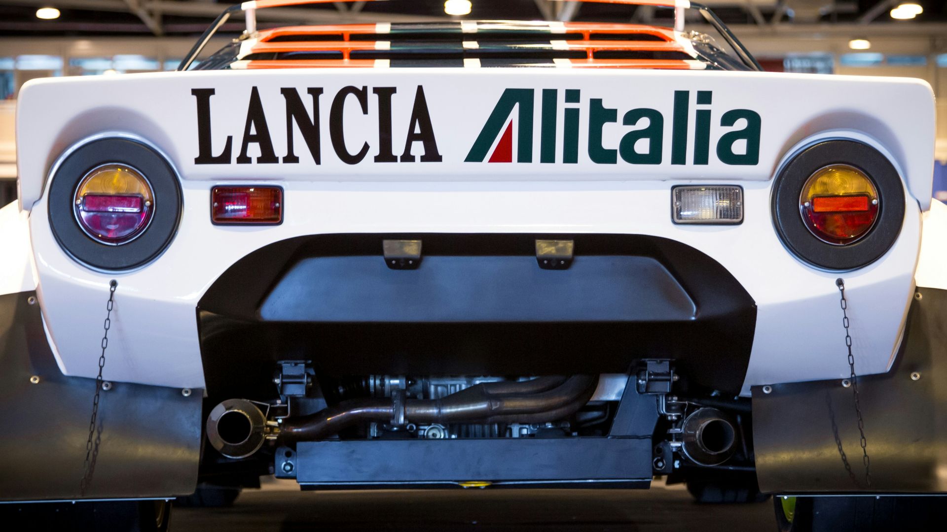 a white car with a sign on it